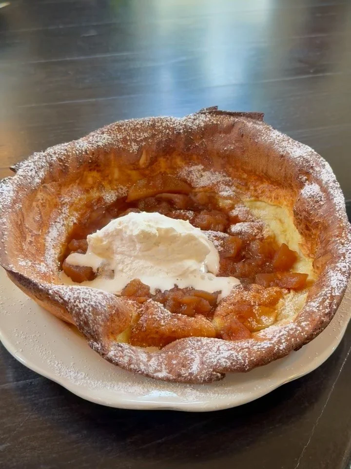 The Sunday brunch menu has recently gotten a big seasonal update and it&rsquo;s all very, very good. Pictured first is the Dutch Baby w/Caramelized Apples &amp; Whipped Cream (plus maple syrup drizzled on top). It&rsquo;s slightly sweet, pleasantly f