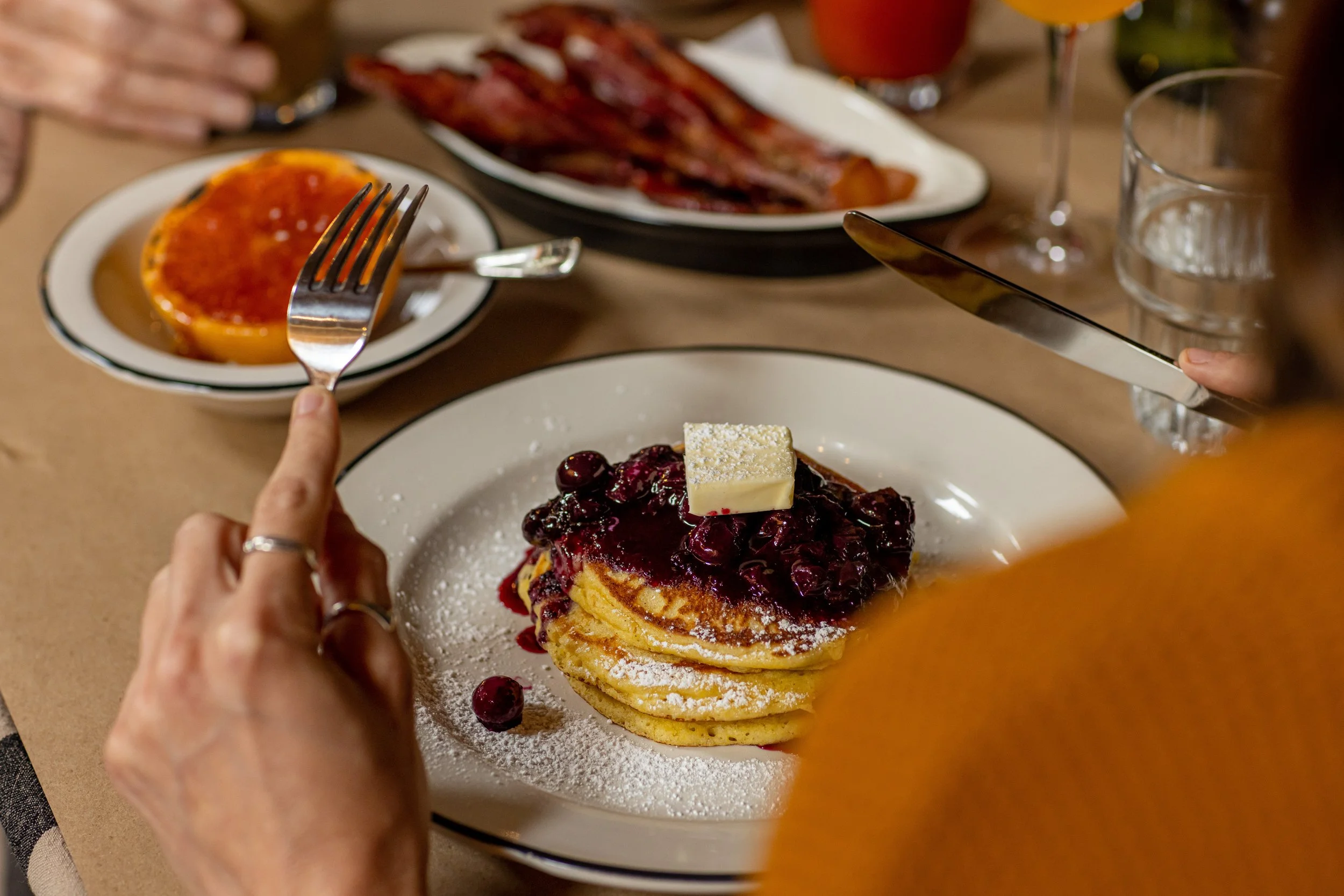 Tall John's tall stack of pancakes and bruleed grapefruit