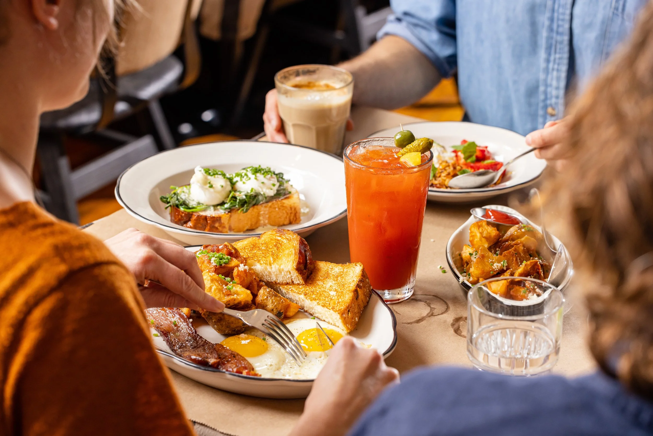 Tall John's brunch table with classic breakfast plate and florentine