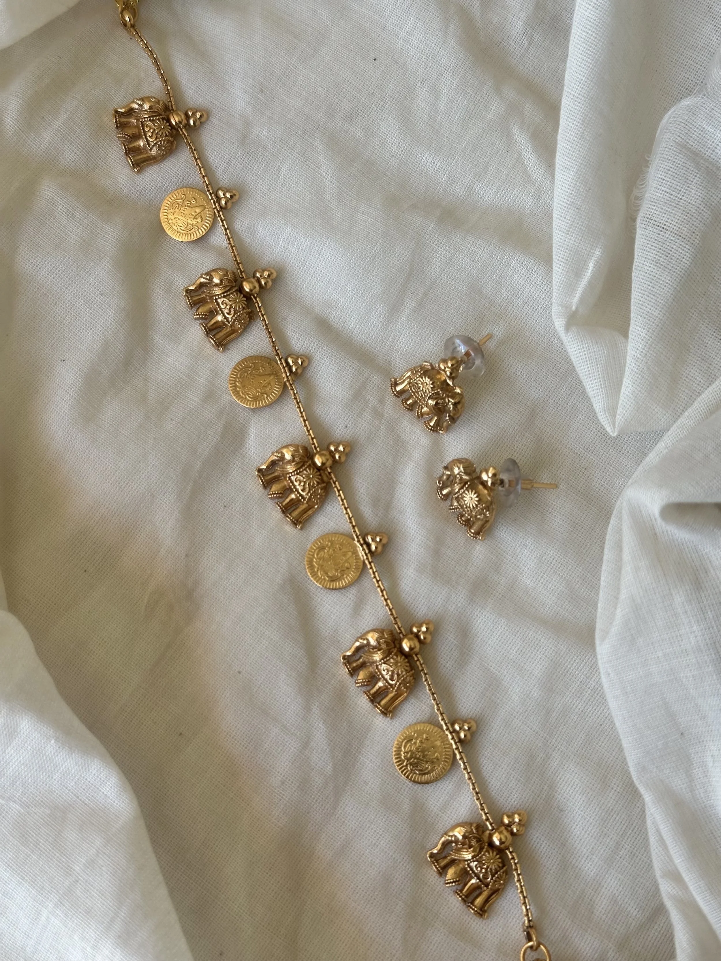 Elephant and coin set