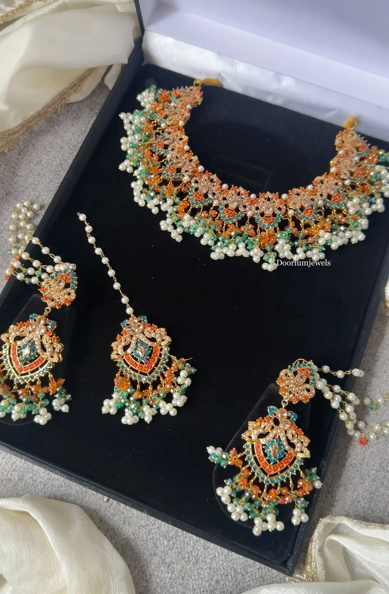 Suba in orange and green