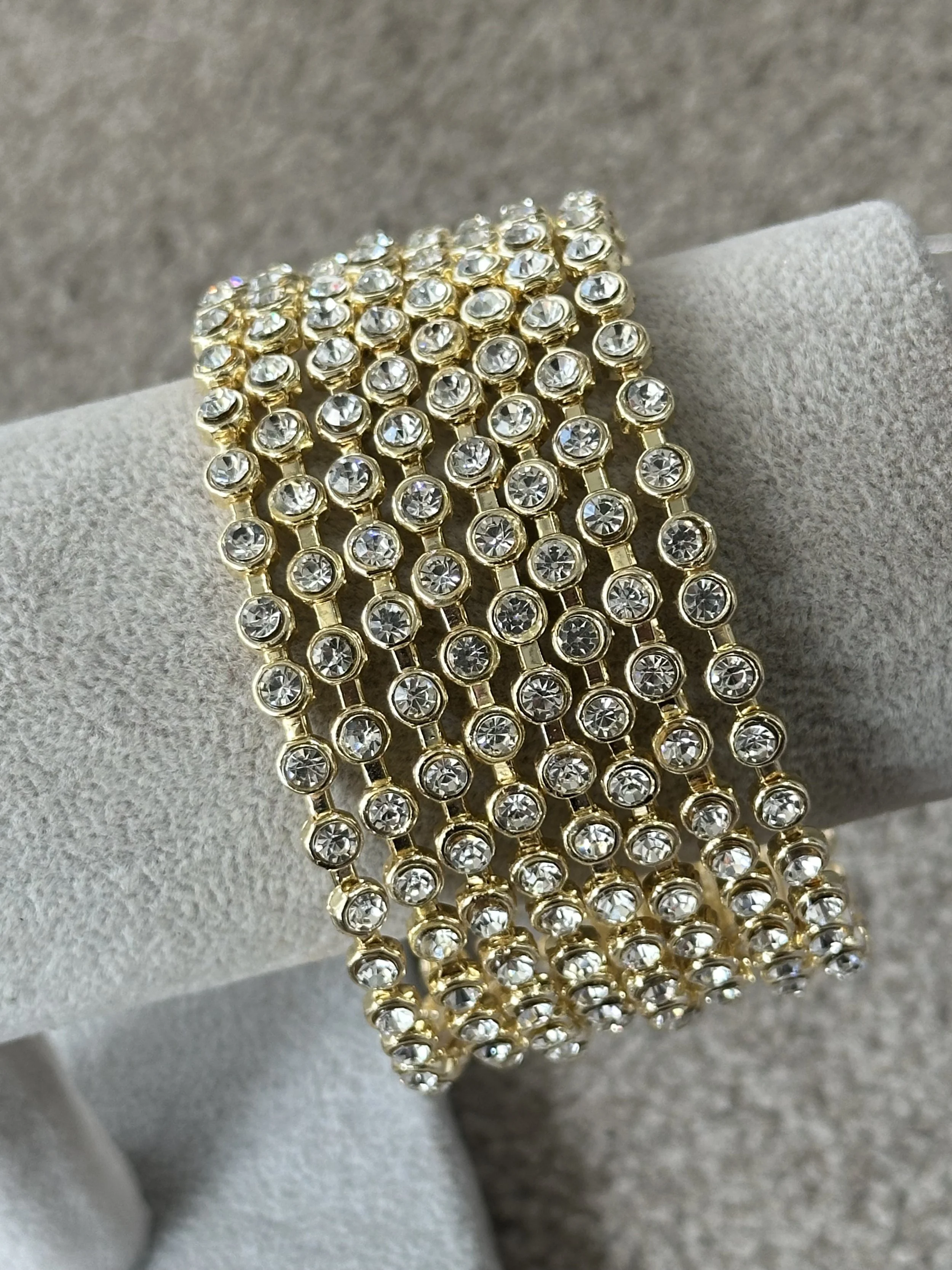 White stone golden bangle