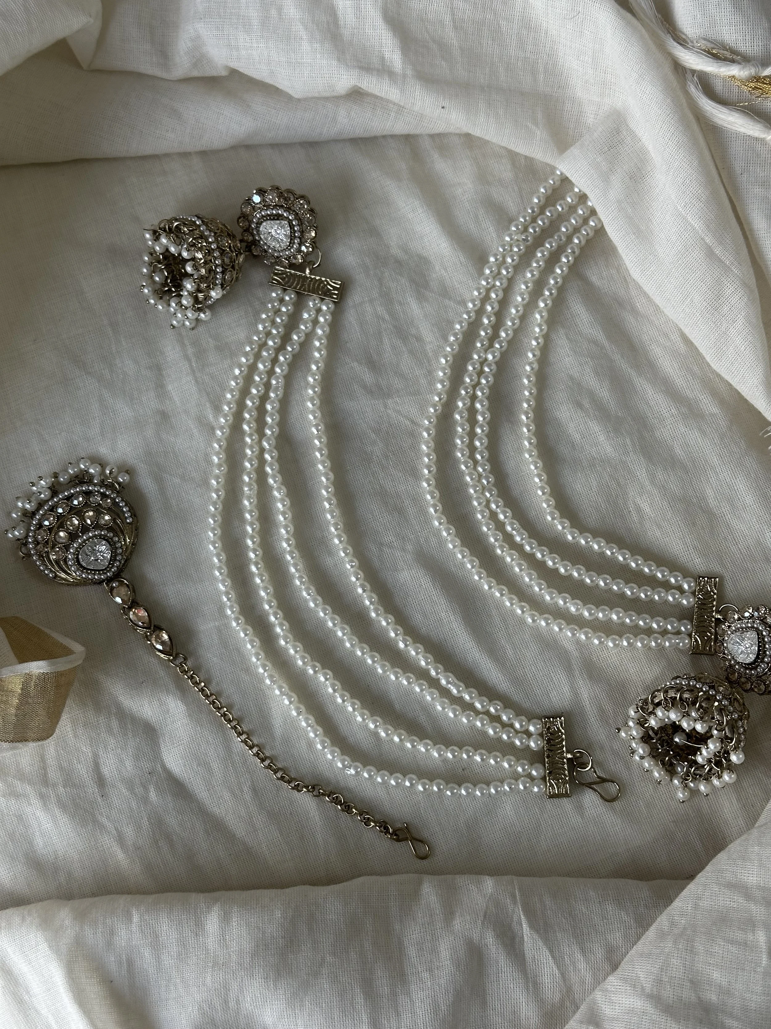 Pearl white and antique gold jhumka set