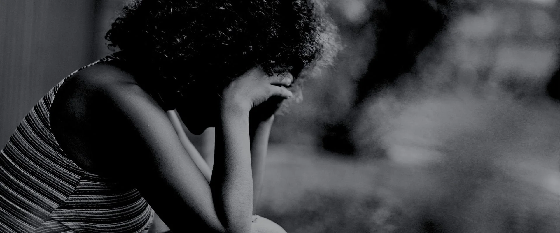 woman crying from pregnancy loss.