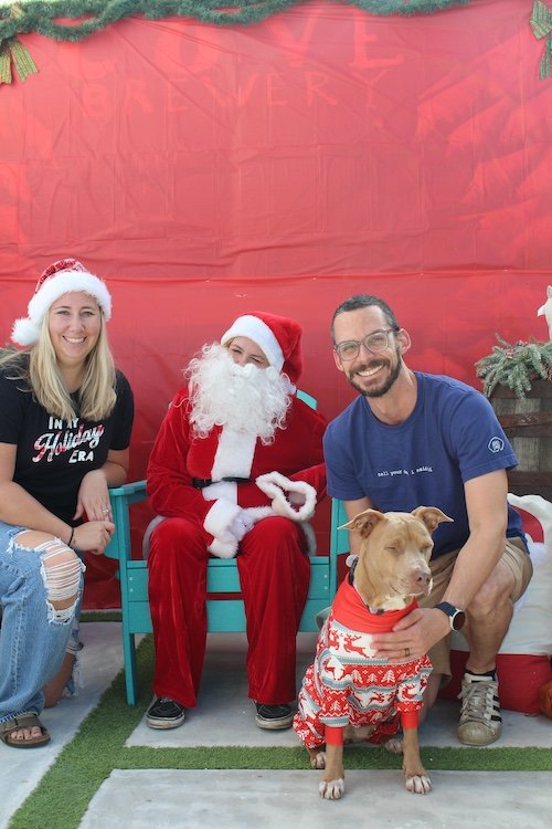 husband-wife-dog-santa-paws-dog-event-cove-brewery-deerfield-beach-florida.JPG