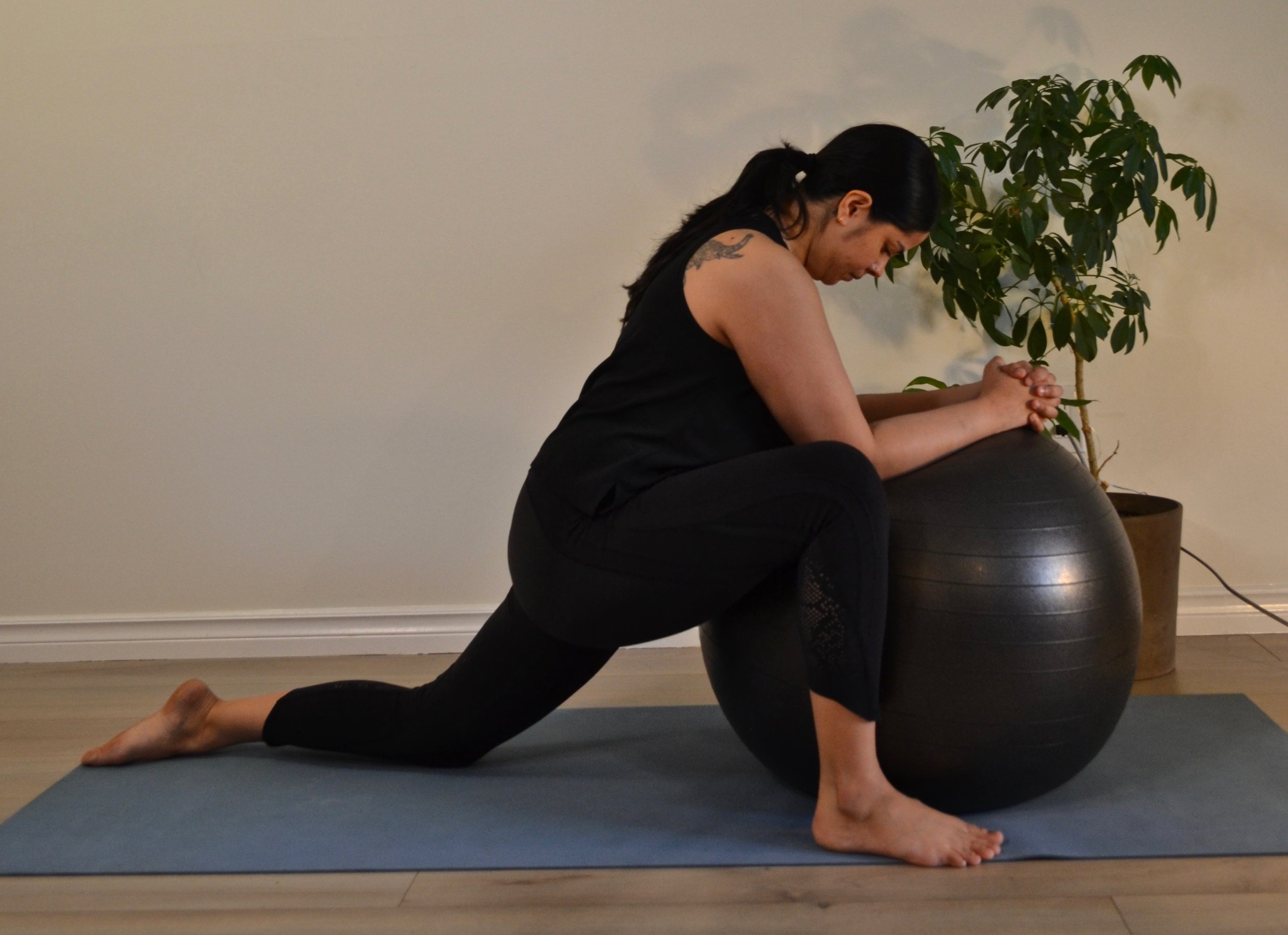 Active Birth Centre - Yoga Pose: Child's Pose Over a Ball - Active
