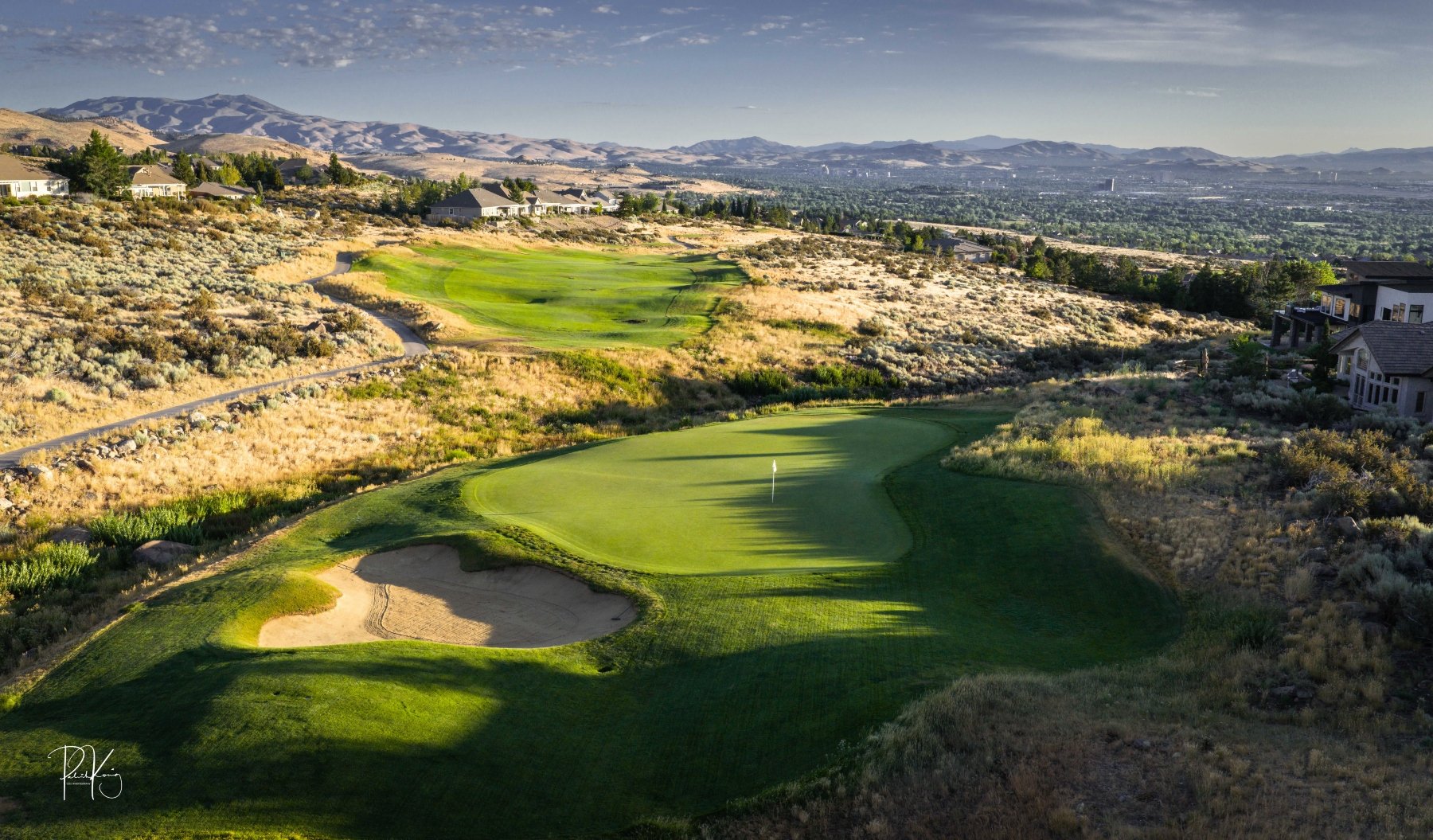 ArrowCreek-Golf-Club-aerial-shot-with-greens-and-houses.jpg