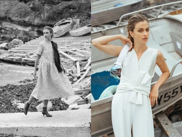 Split image of a woman in different settings; left side shows a woman in a long dress and boots standing on a dock near water, with boats and rocky shoreline in the background, in black and white; right side shows a woman in a white sleeveless jumpsu