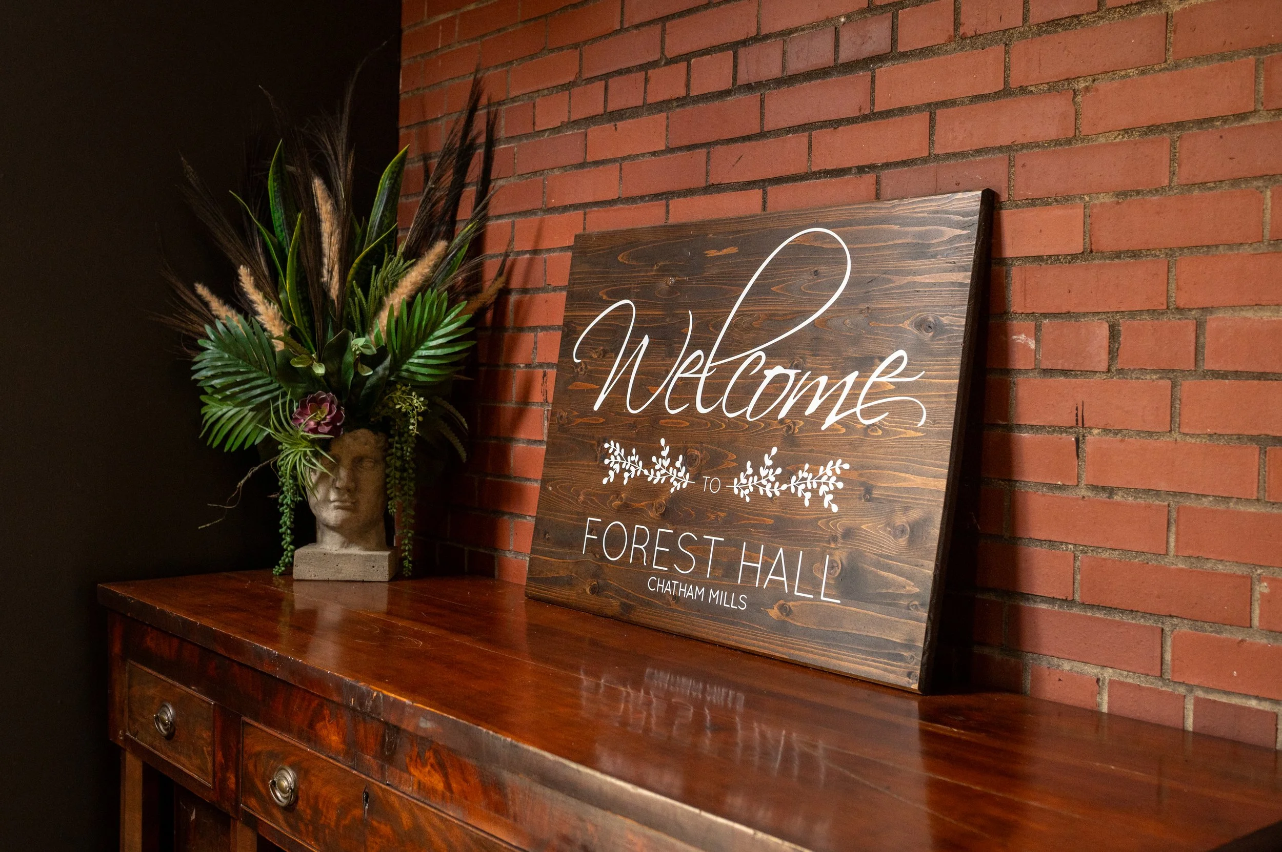 A welcome sign in the foyer of Forest Hall at Chatham Mills.