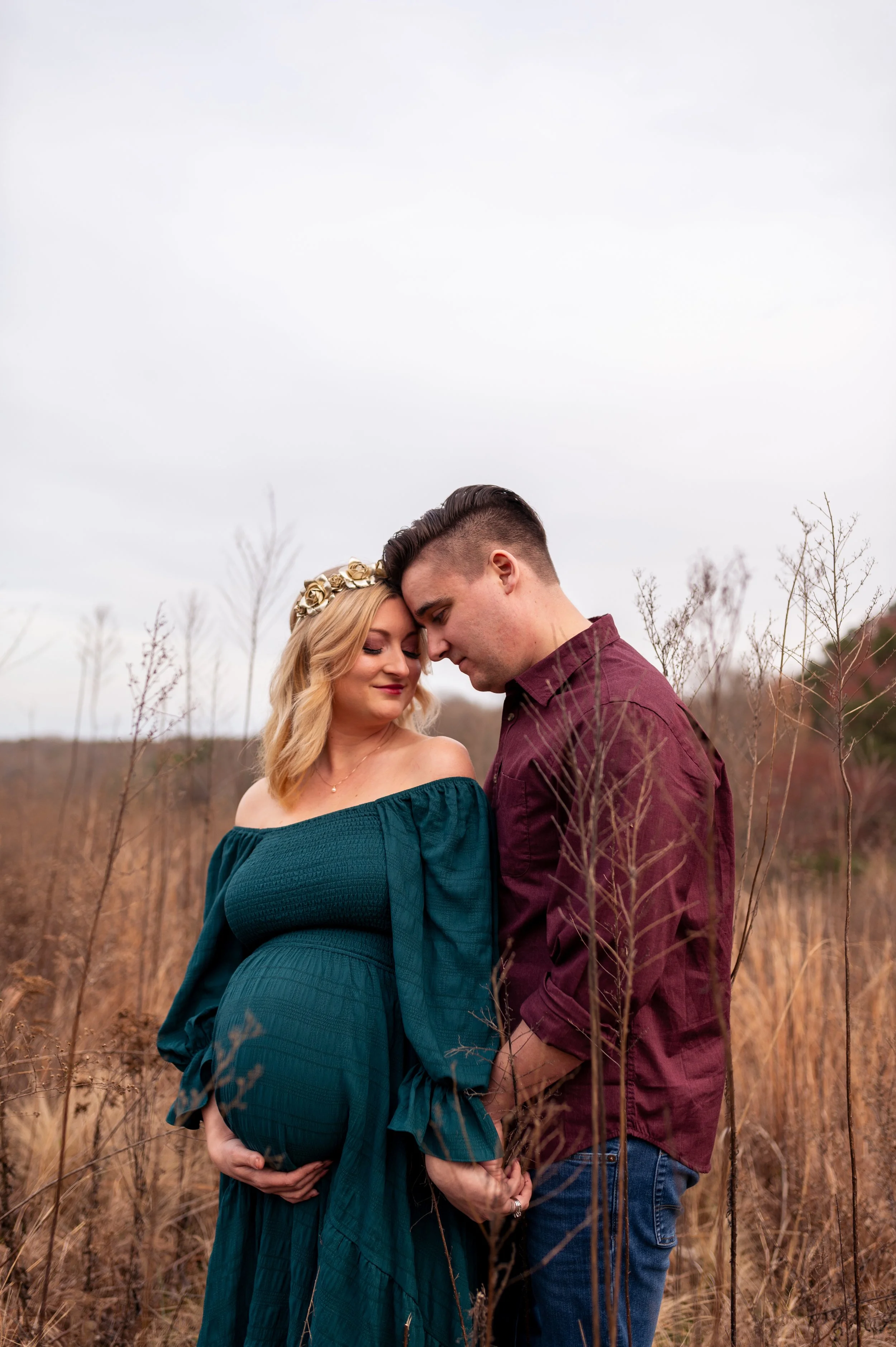 Maternity photography by Briana Woods: Couple cuddles at the NCMA in Raleigh.