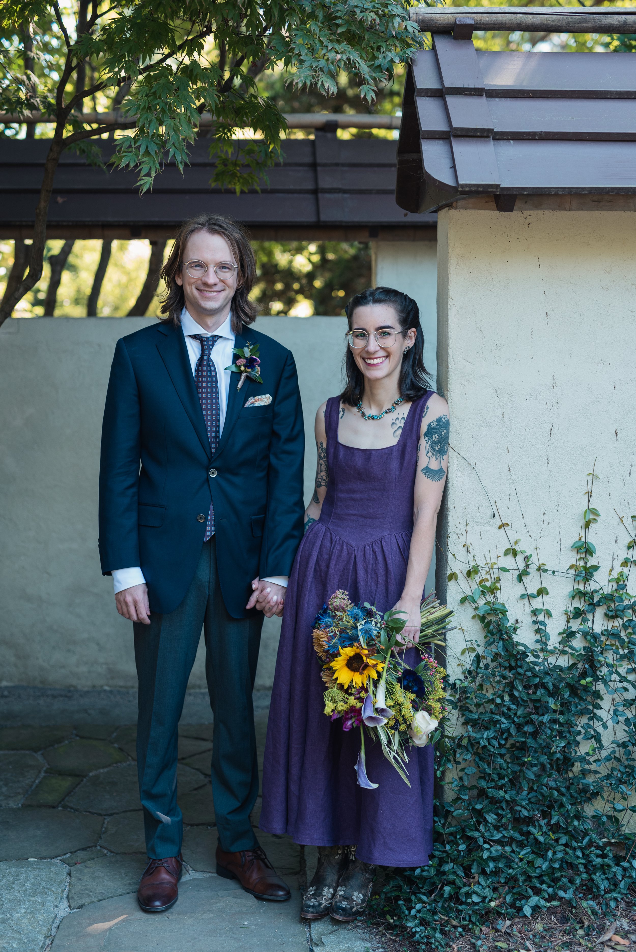 Wedding photography by Briana Woods: The couple holding hands.