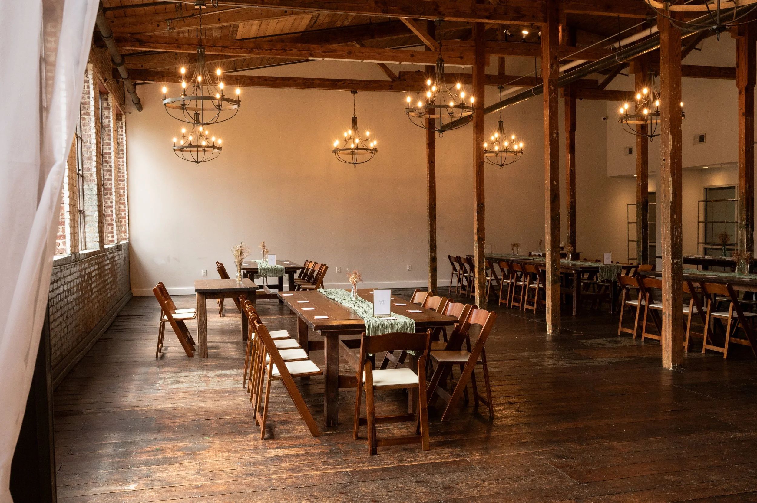 The boho, rustic wedding reception hall at Forest Hall at Chatham Mills.