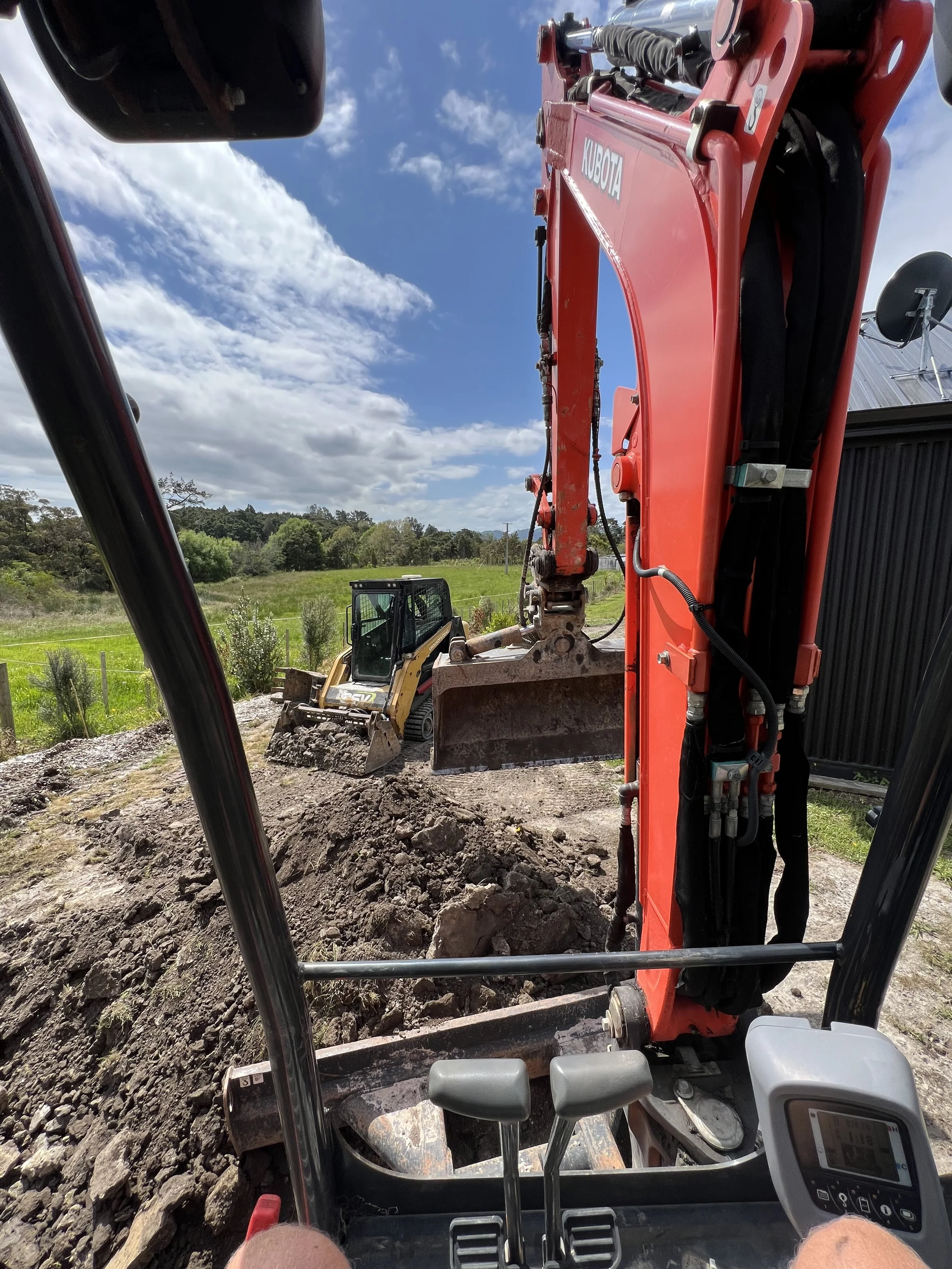 Lawn site preparation with skid steer Mangawhai Northland