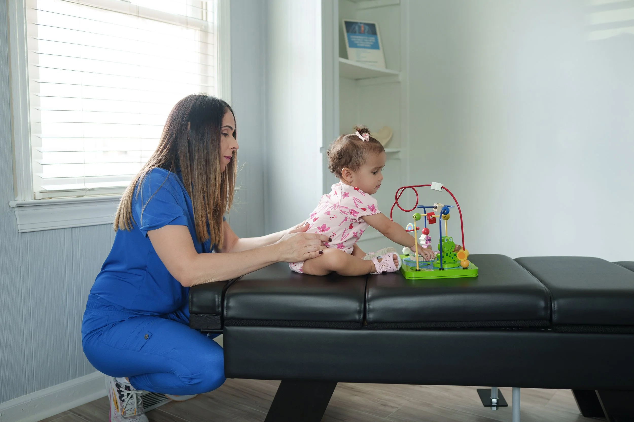 Pediatric chiropractic adjustment for children at Live Well Family Chiropractic in Columbus GA