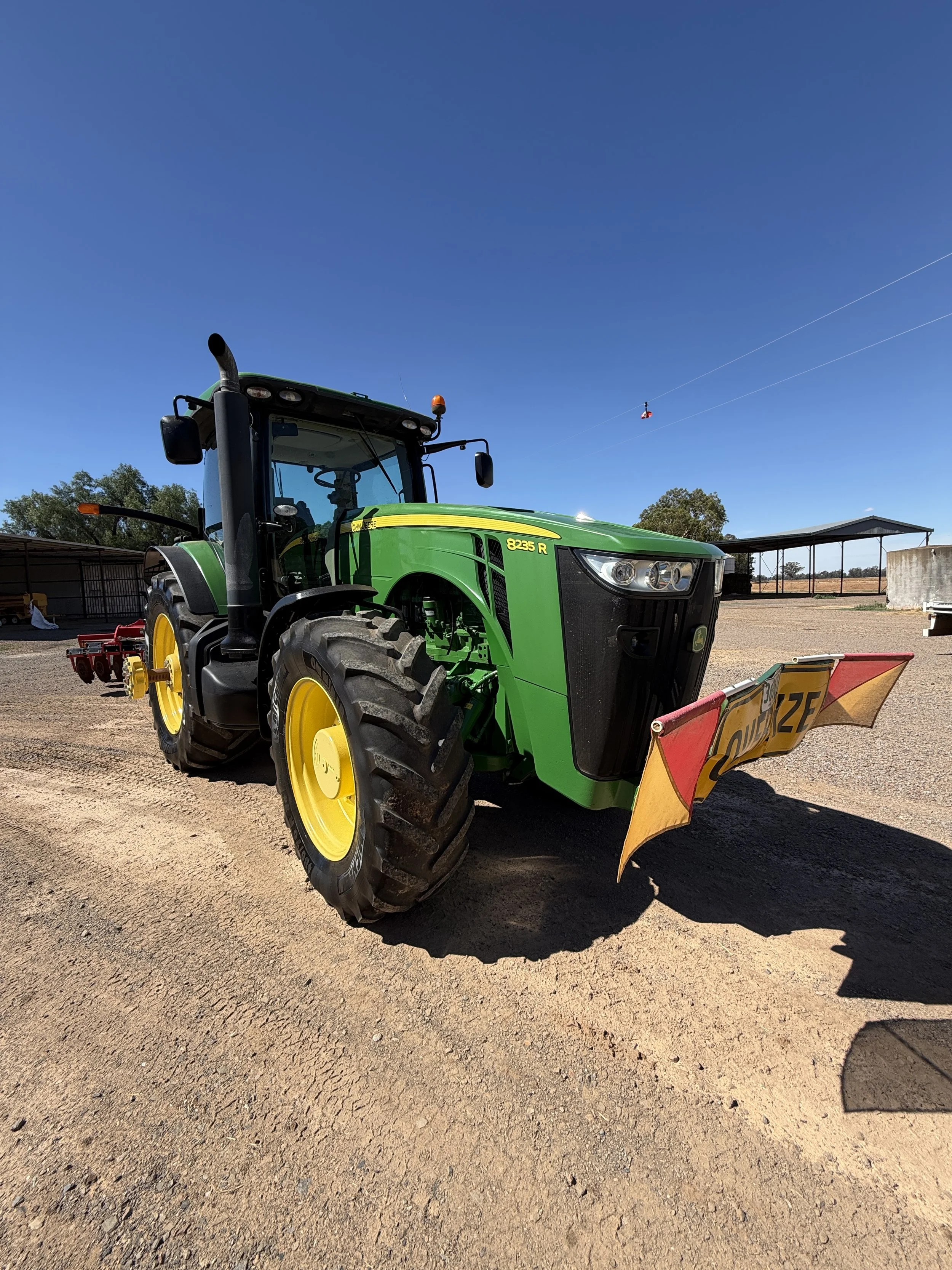John Deere 8235R FWA Tractor.