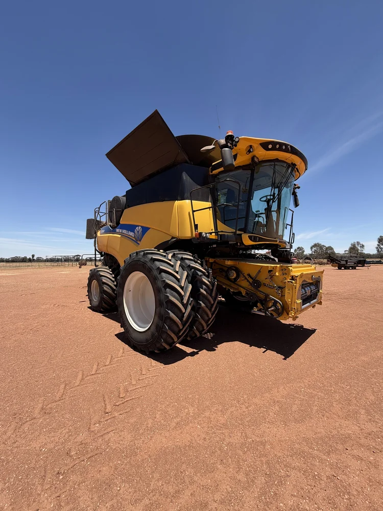 New Holland CR9.90 Combine with Macdon D140 Front with Trailer for sale at Midstate Machinery Brokers