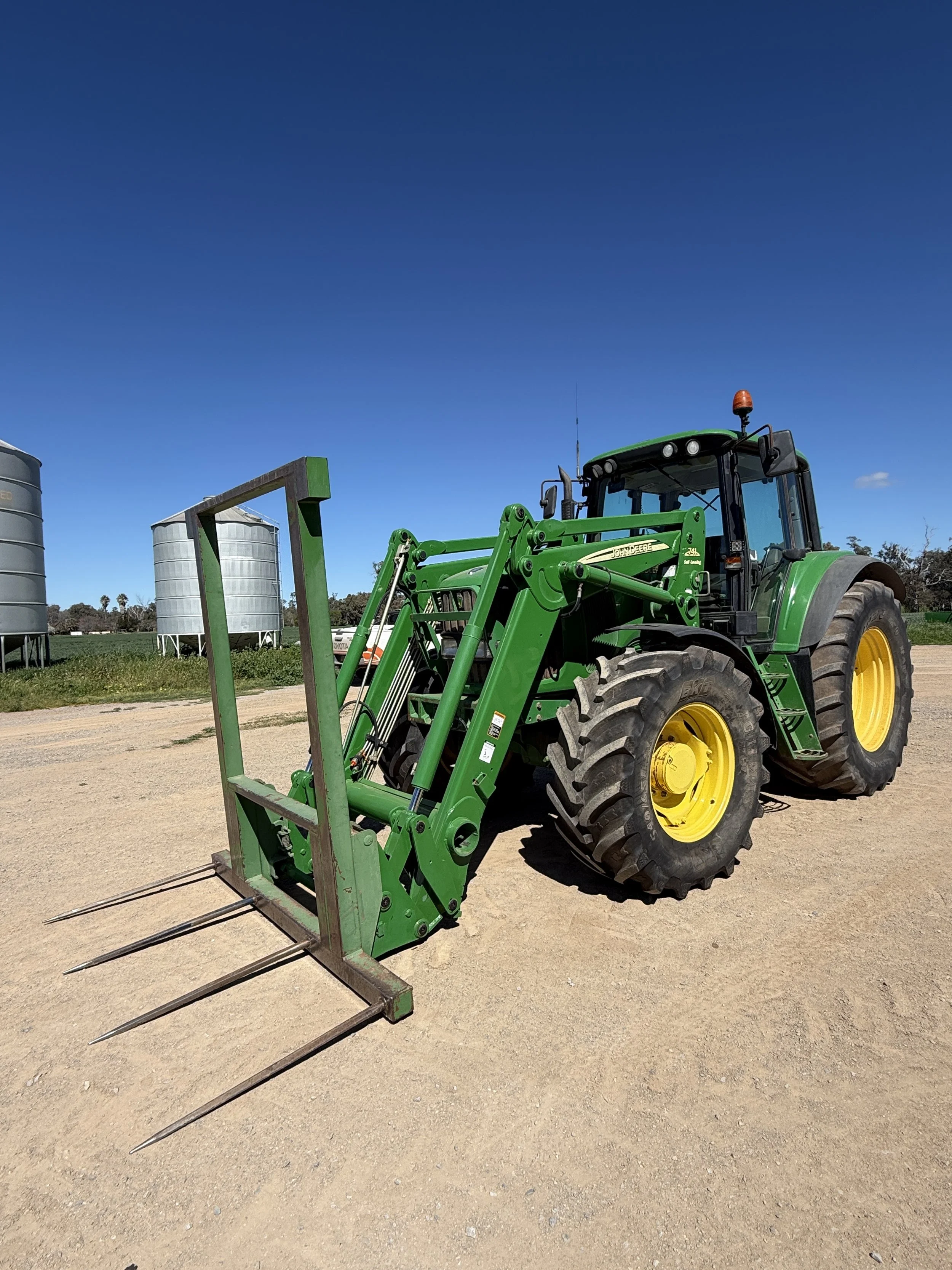 John Deere 6820 FWA with 741 Loader.