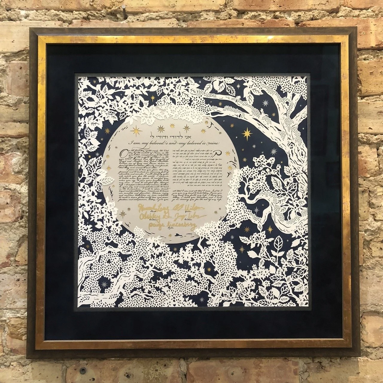 Hand cut Paper Ketubah framed in gold