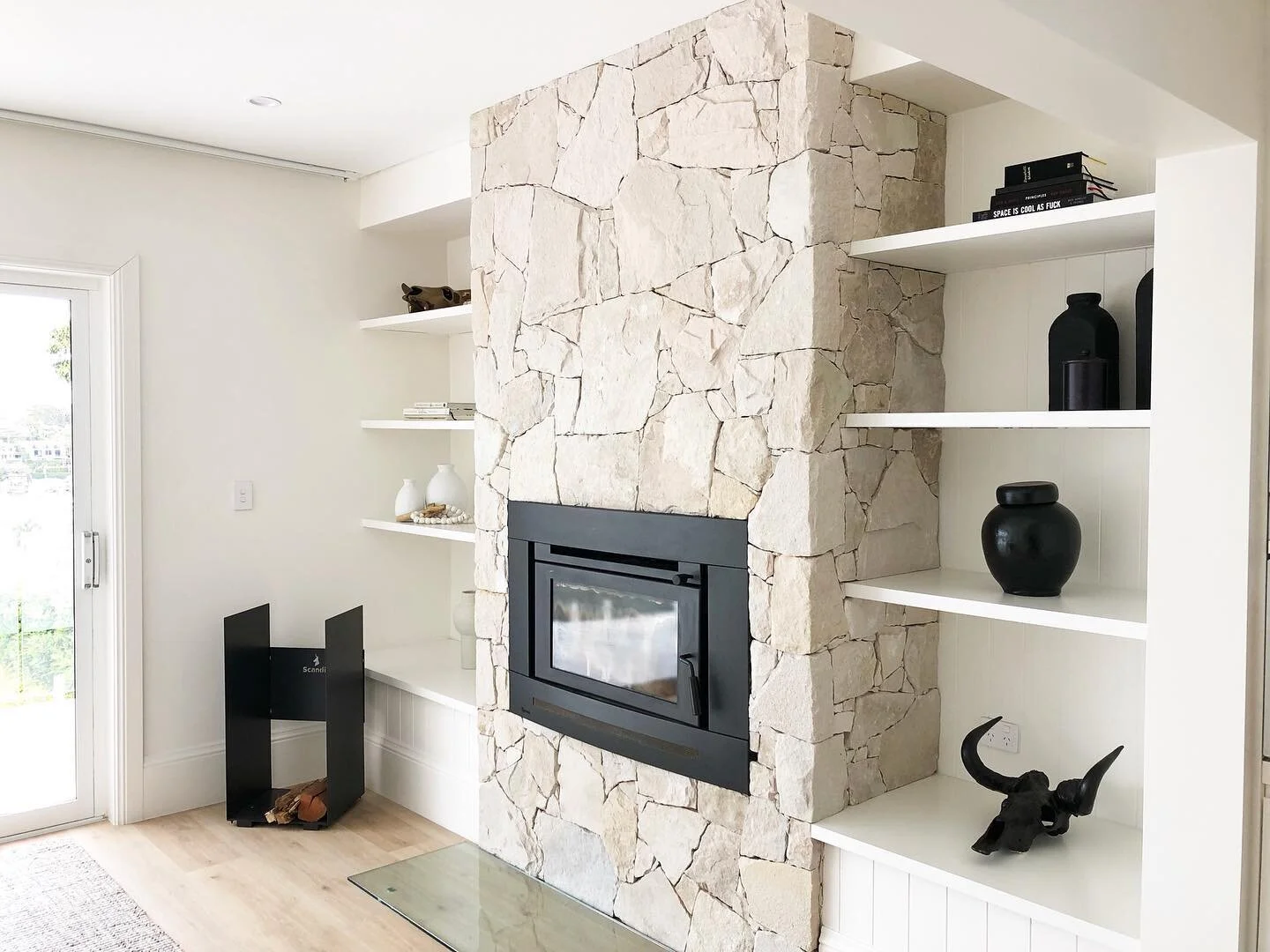 Fireplace goals 🔥
We love the combination of stacked stones with VJ paneling!