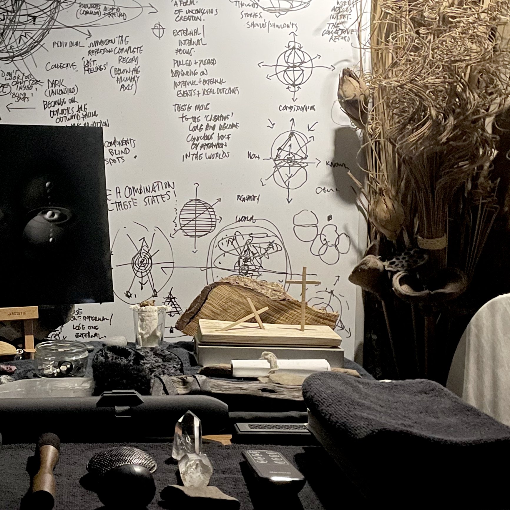 Shamanic tools, drum and symbolic notes in the Rochilez & Conner practice space