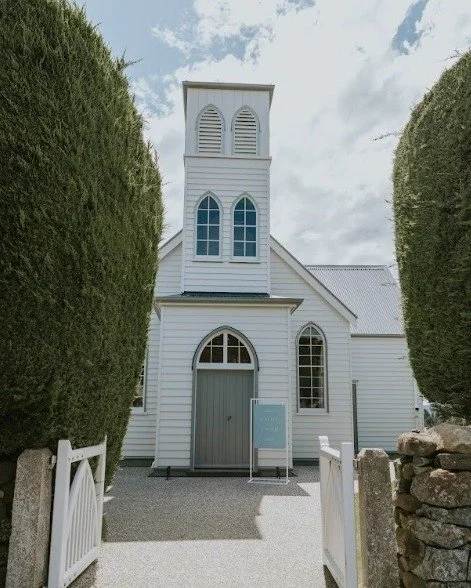A storybook &ldquo;I do&rdquo;

This darling little church in Pukehiki is tucked between hedges and big skies, quiet, sunlit, and perfect for vows that feel intimate and timeless. If you&rsquo;re dreaming of a ceremony with charm (and photos to match