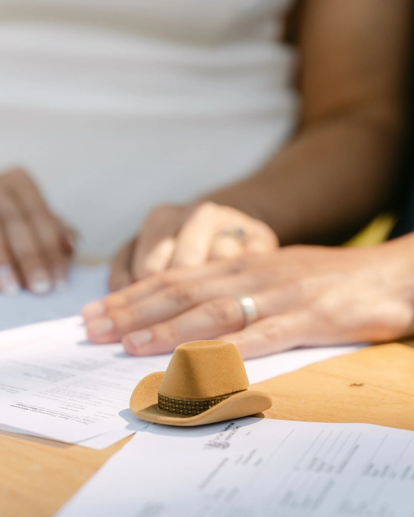 The details matter, especially the ones that show a little bit of who you are.

Whether it is miniature cowboy hats, dinosaurs on the cake or something else that makes people immediately think of you, or they just make you smile, these are the touche