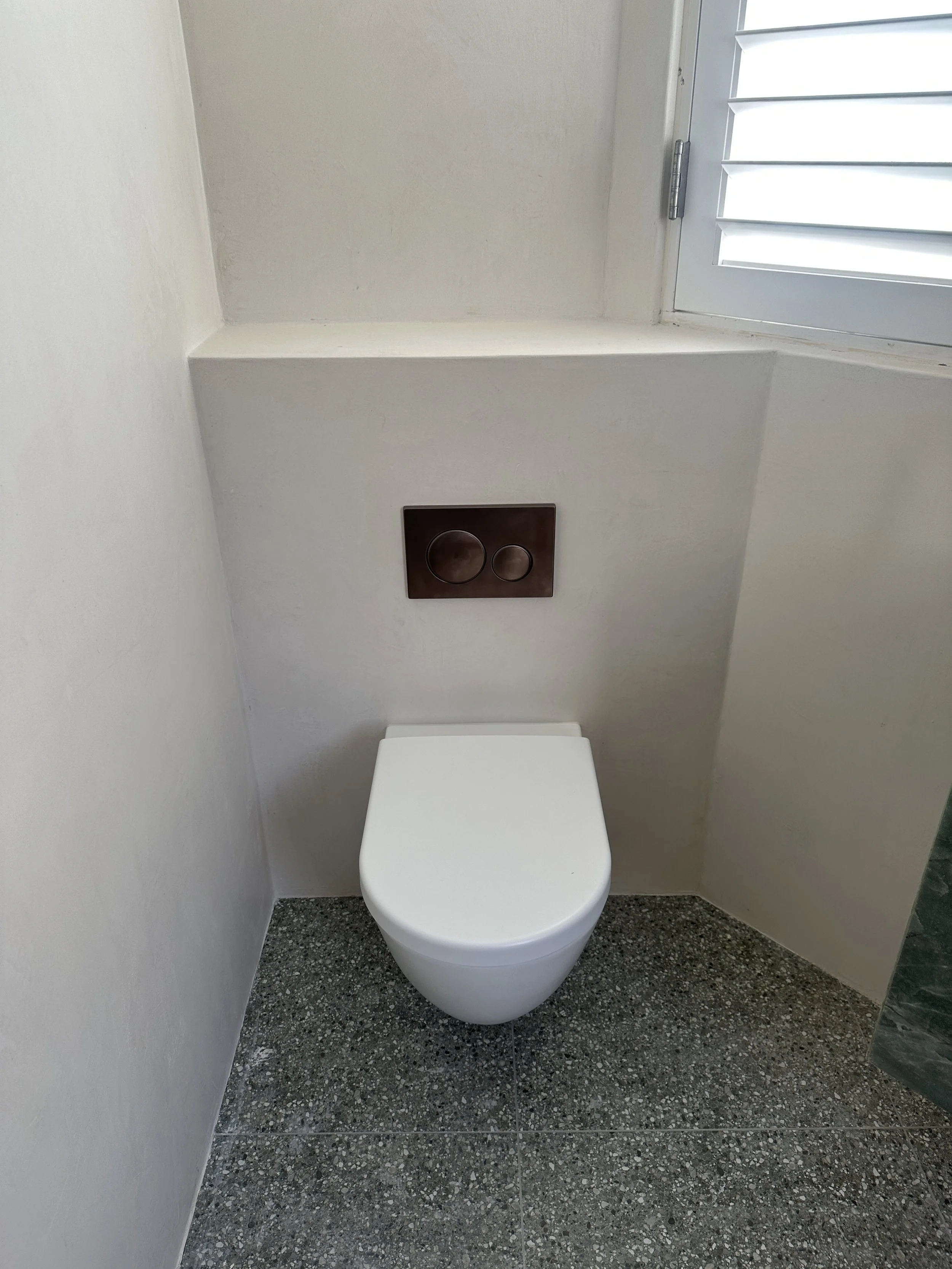 Wall Hung Toilet And In-Wall Cistern At A Noosa Renovation For Iezzi Built