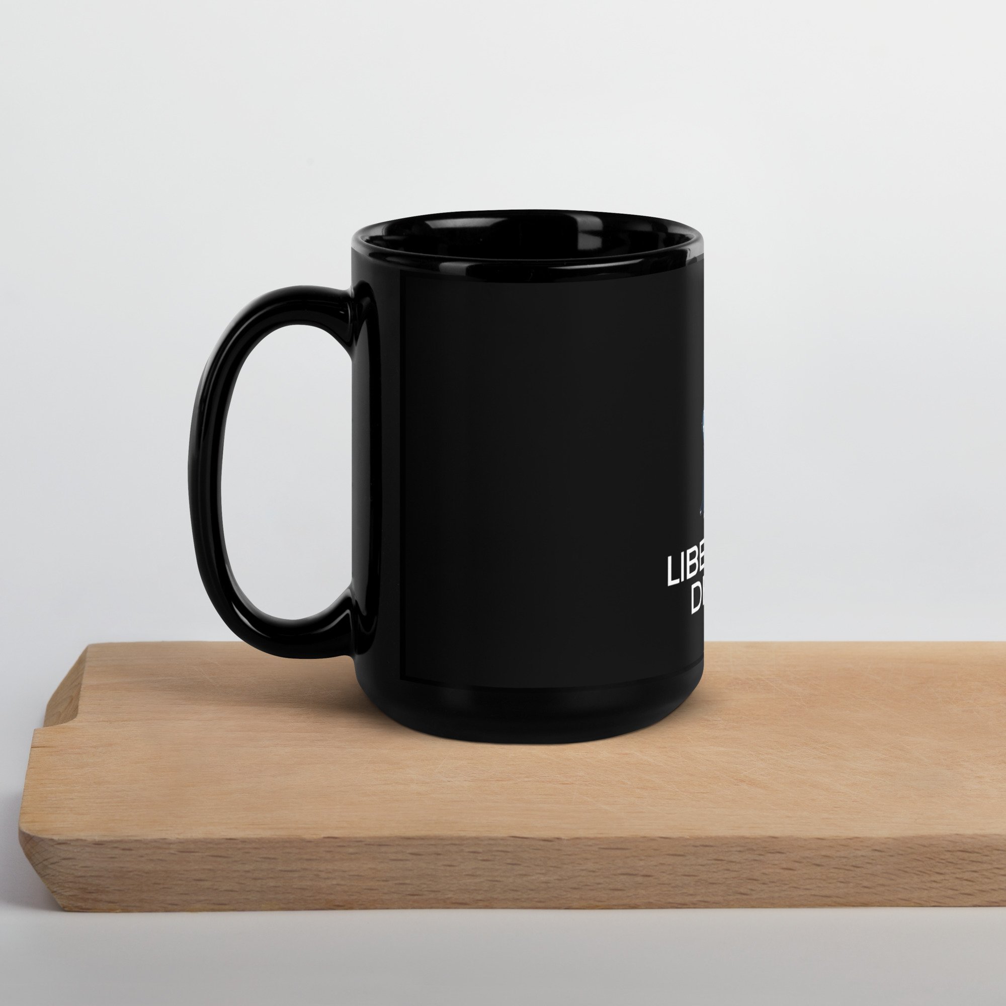 black-glossy-mug-black-15oz-handle-on-left-6387b13e2f124.jpg