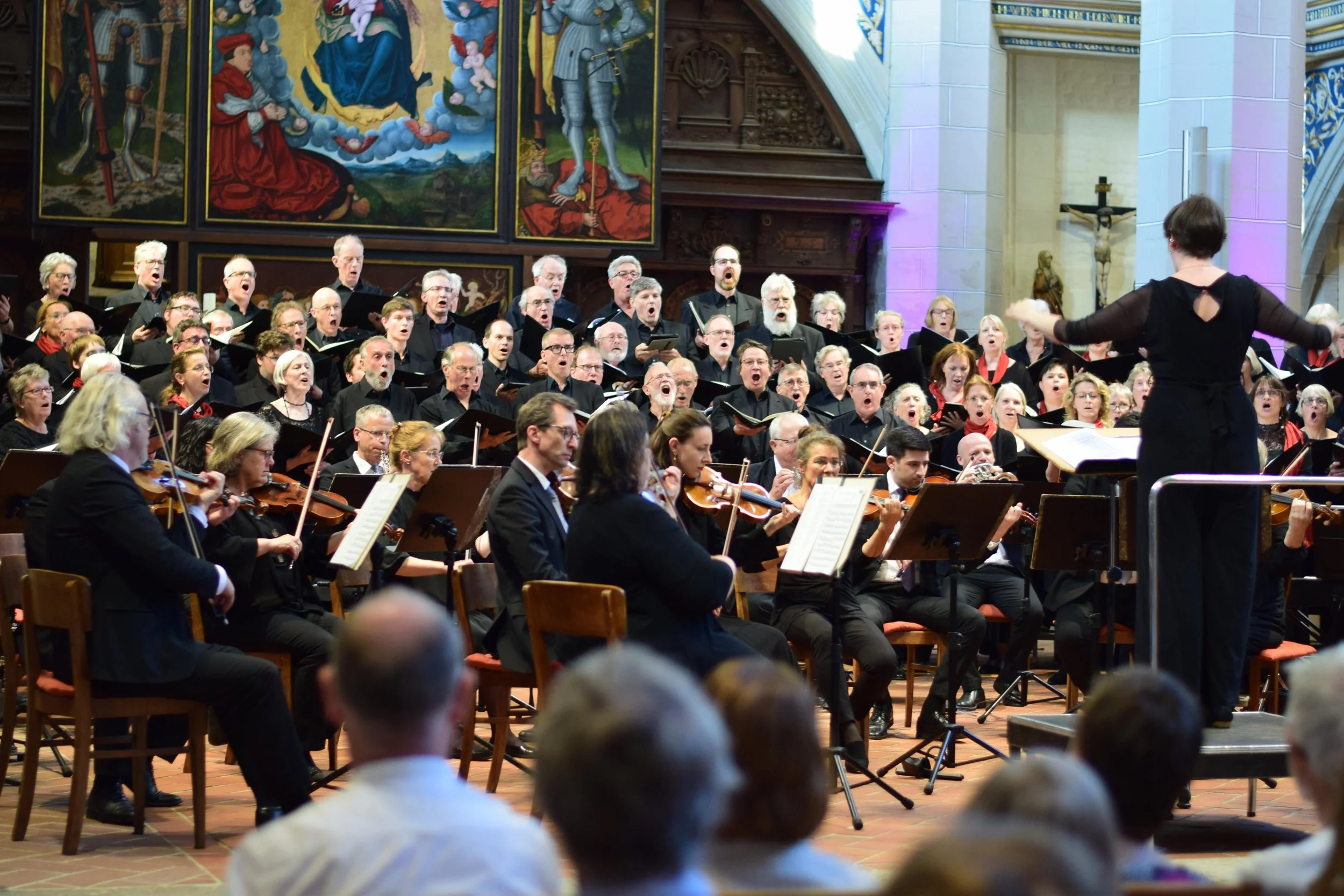 Rosie conducting Zadok the Priest in the Marktkirche, Halle