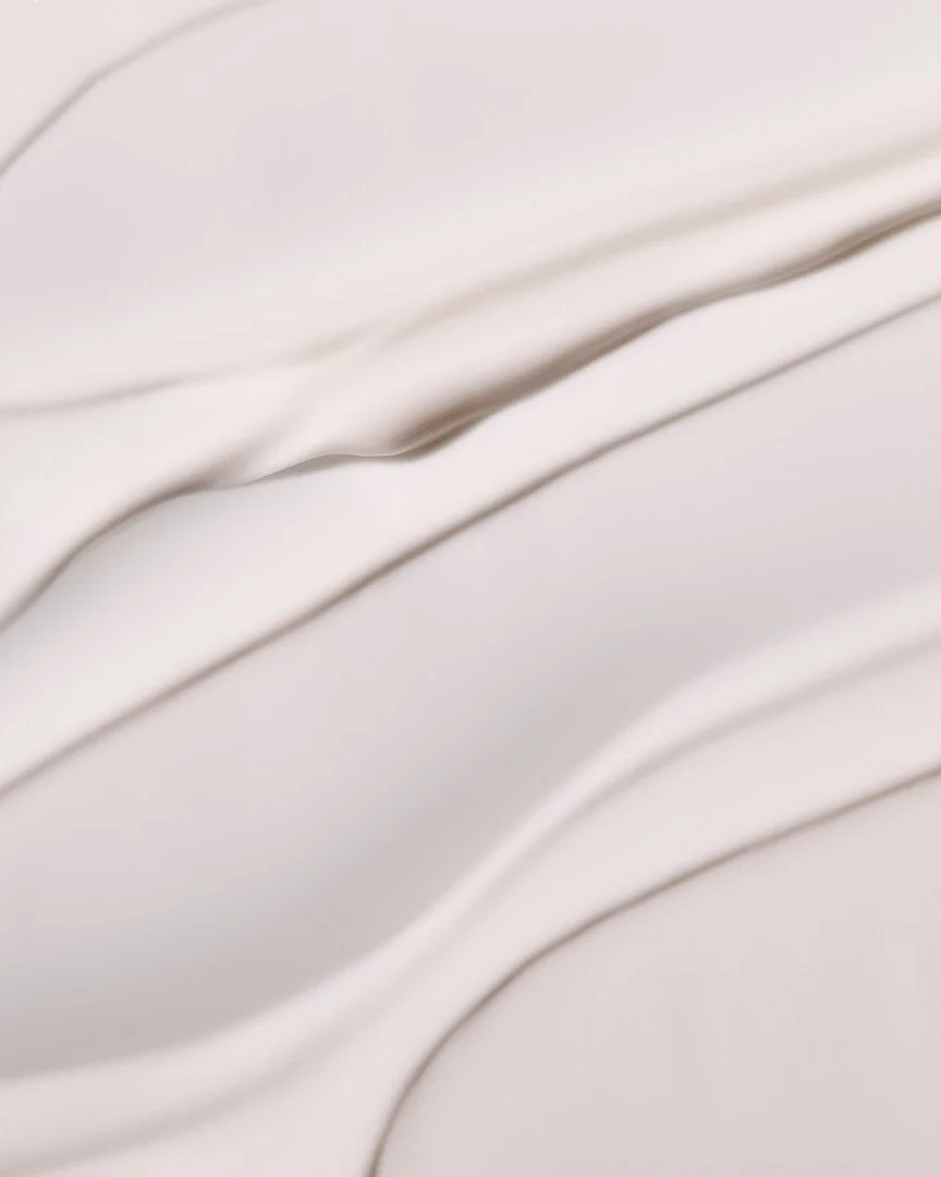 Luxury body lotion texture swipe by Adrianna Favero, NYC-based beauty photographer. Clean, radiant lighting highlights skincare textures —ideal for campaigns, e-comm, and editorial beauty stories.