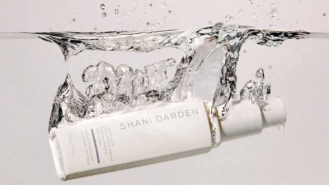 Still life splash image of Shani Darden Toner by Adrianna Favero, NYC-based beauty still-life photographer and director. Capturing dynamic motion and fresh skincare aesthetics—ideal for luxury beauty campaigns, product launches, and editorial feature