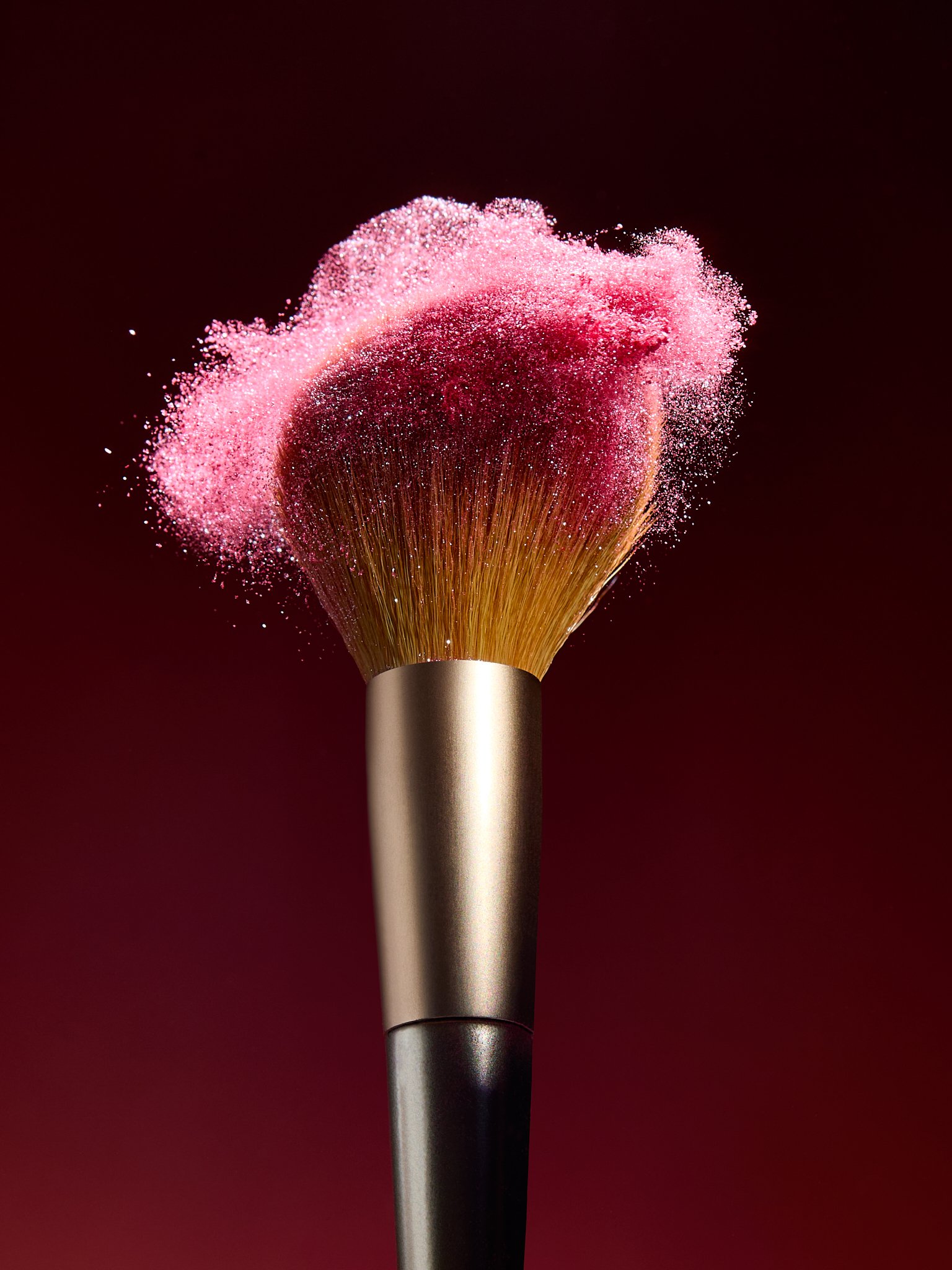 Beauty still life powder explosion by Adrianna Favero, NYC-based beauty still-life photographer and director. Capturing dynamic motion and vibrant textures—ideal for makeup campaigns, editorial features, and high-impact brand storytelling. Inquire to