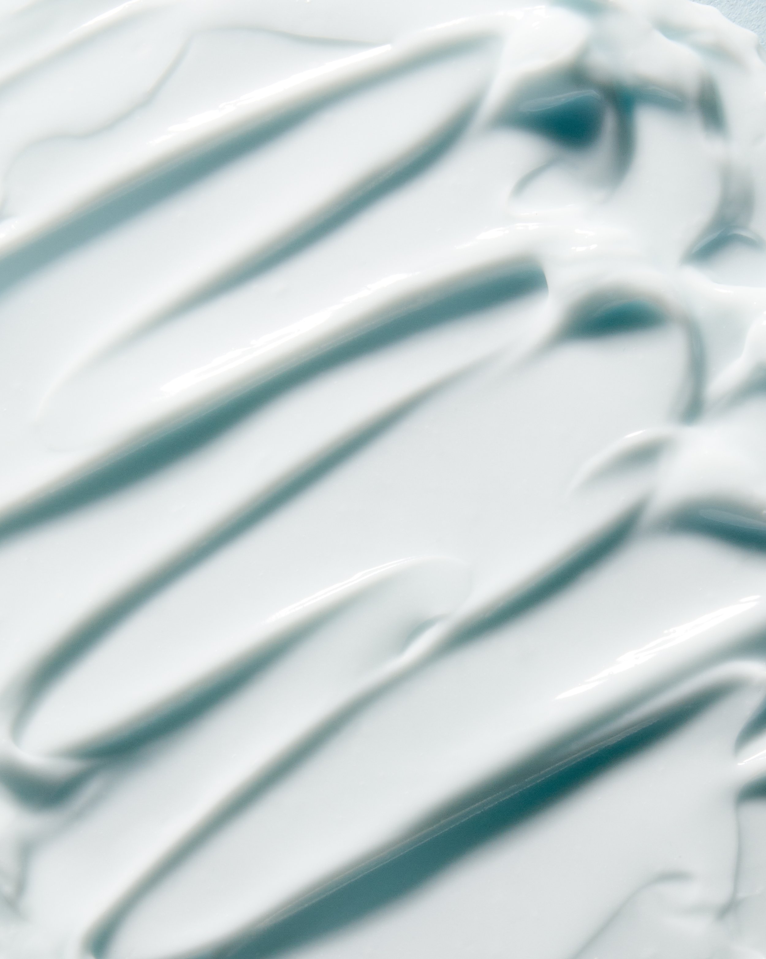 Luxury body lotion texture swipe by Adrianna Favero, NYC-based beauty photographer. Clean, radiant lighting highlights skincare textures —ideal for campaigns, e-comm, and editorial beauty stories.