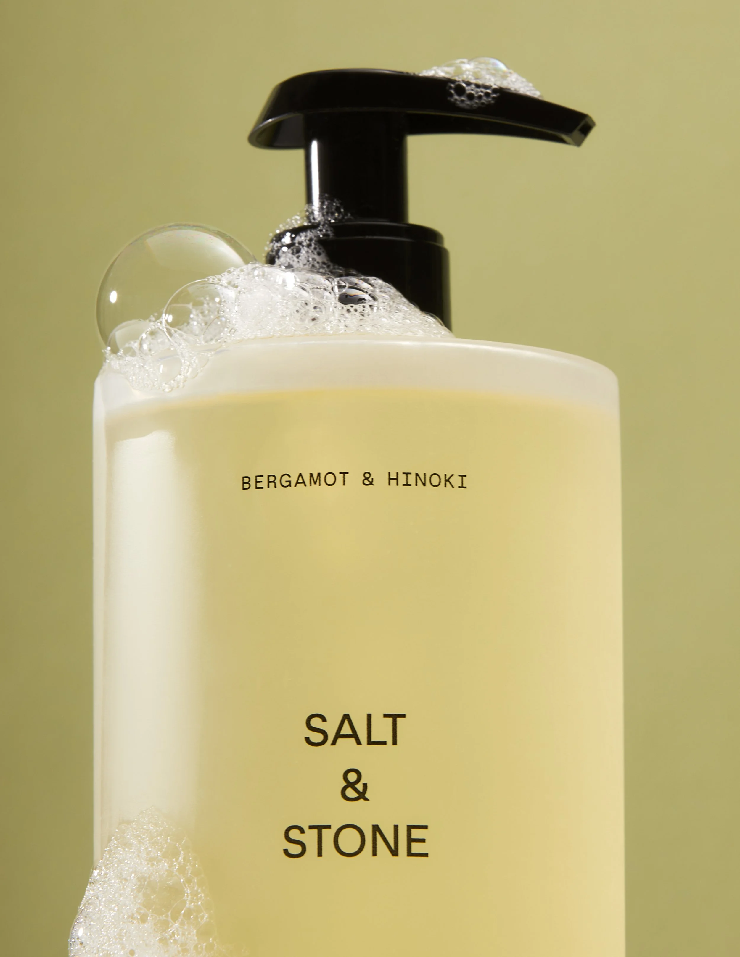 Lifestyle branding image of Salt & Stone soap by Adrianna Favero, NYC-based photographer and director. Featuring fresh bubbles and natural styling—perfect for skincare campaigns, wellness branding, and e-commerce visuals.