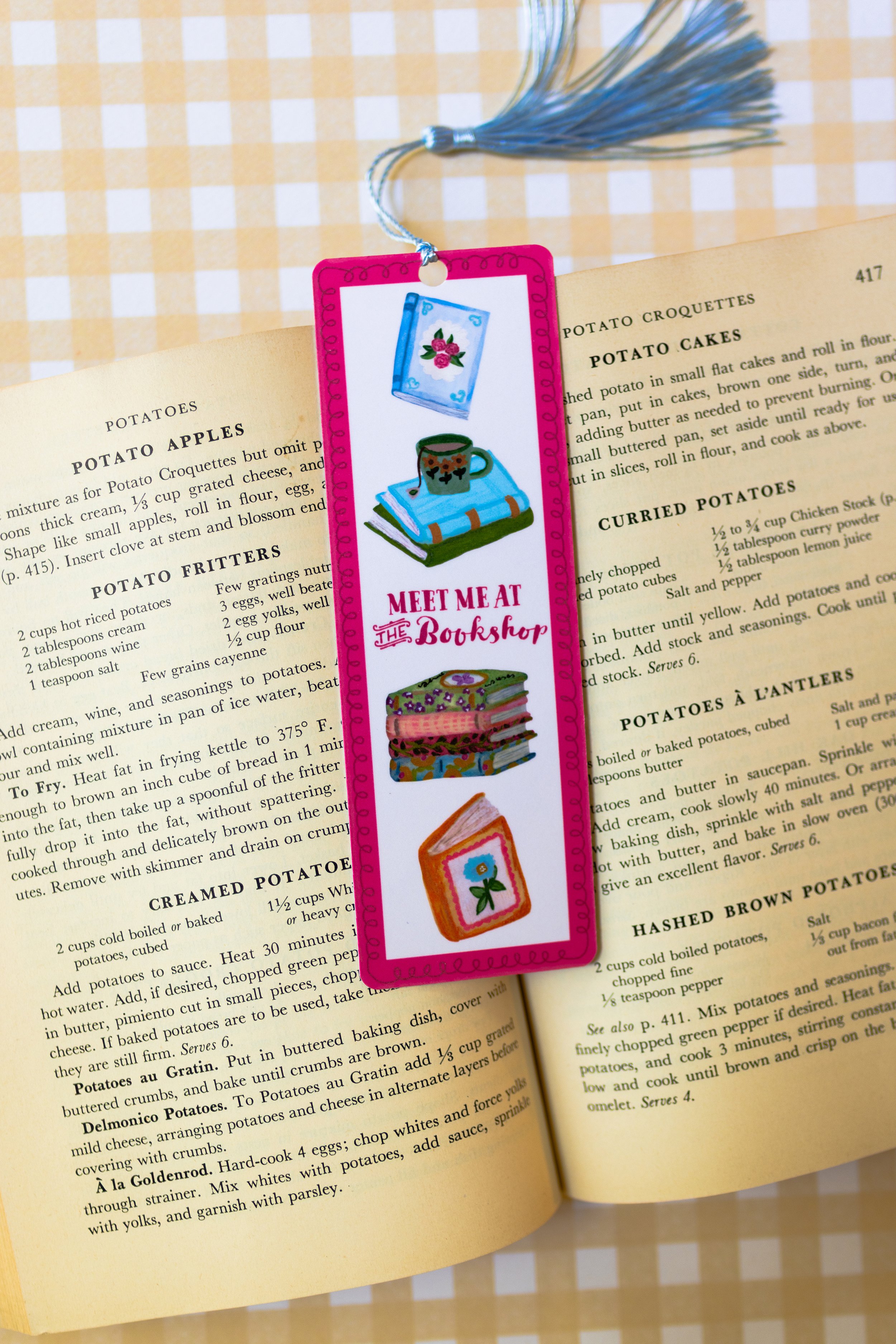 Meet me at the bookshop illustrated bookmark with colorful book designs