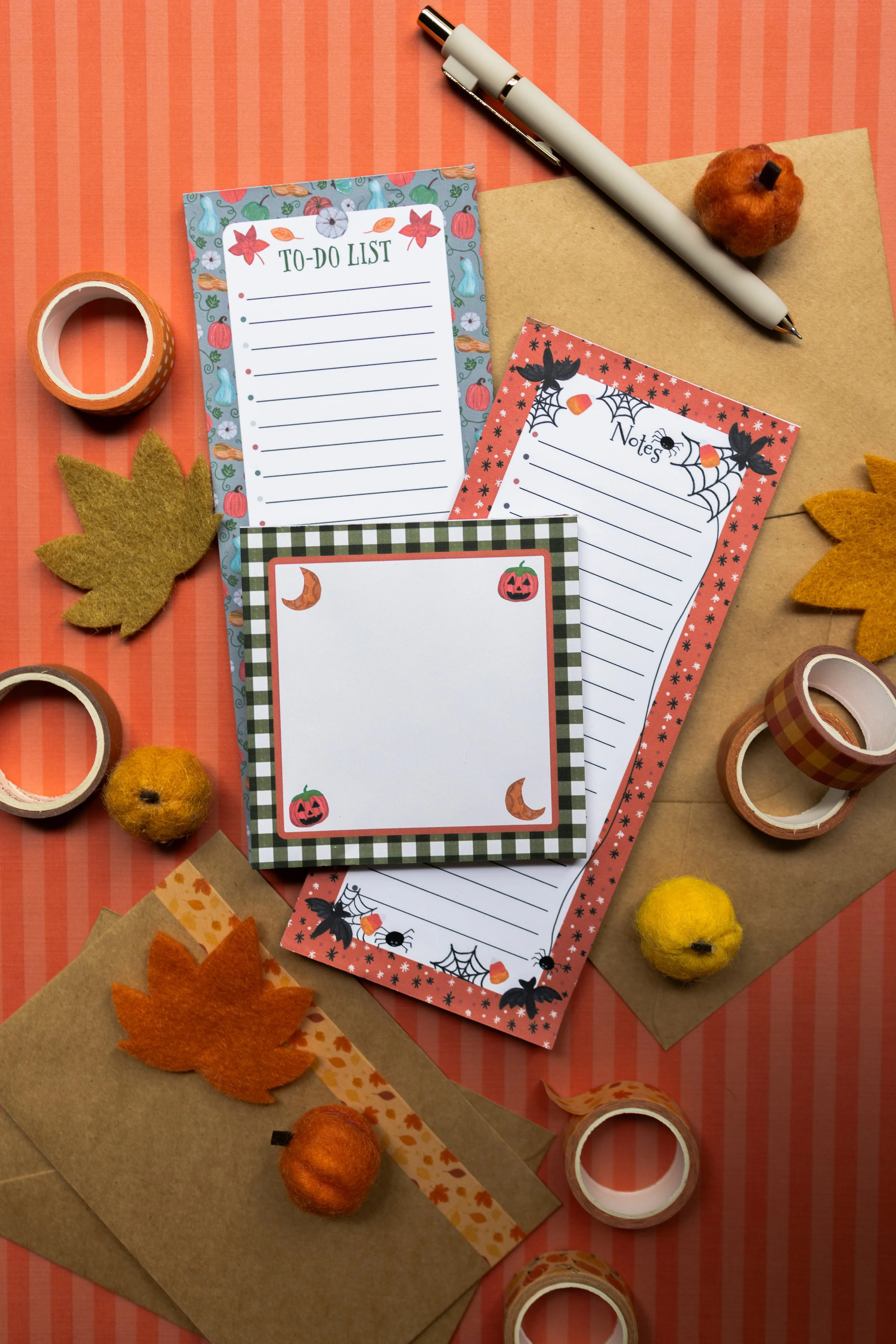 Dear Little Halloween Notepad Collection featuring three artist-designed fall and Halloween notepads with pumpkins, bats, jack-o'-lanterns and vintage-inspired artwork.