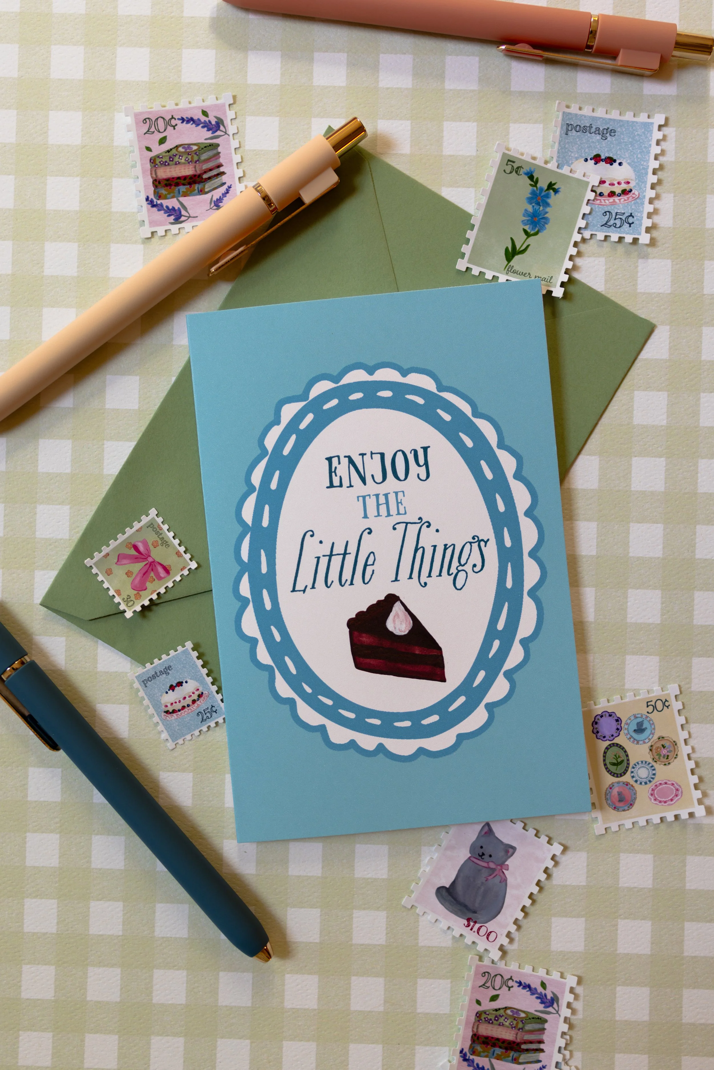 Cottagecore greeting card featuring cake illustration and blue background.