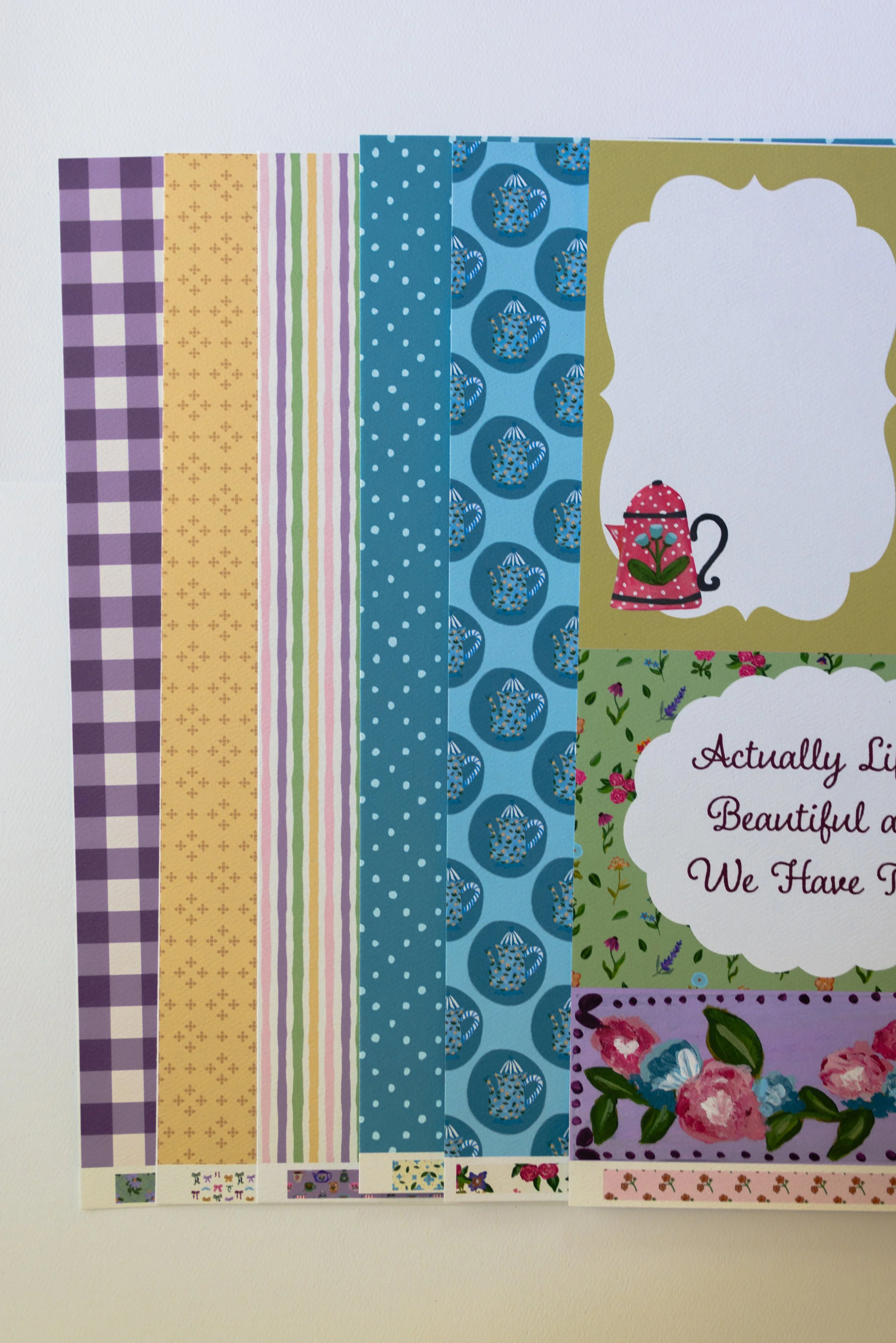 Coordinating scrapbook supplies designed to mix and match for creative paper crafting projects.