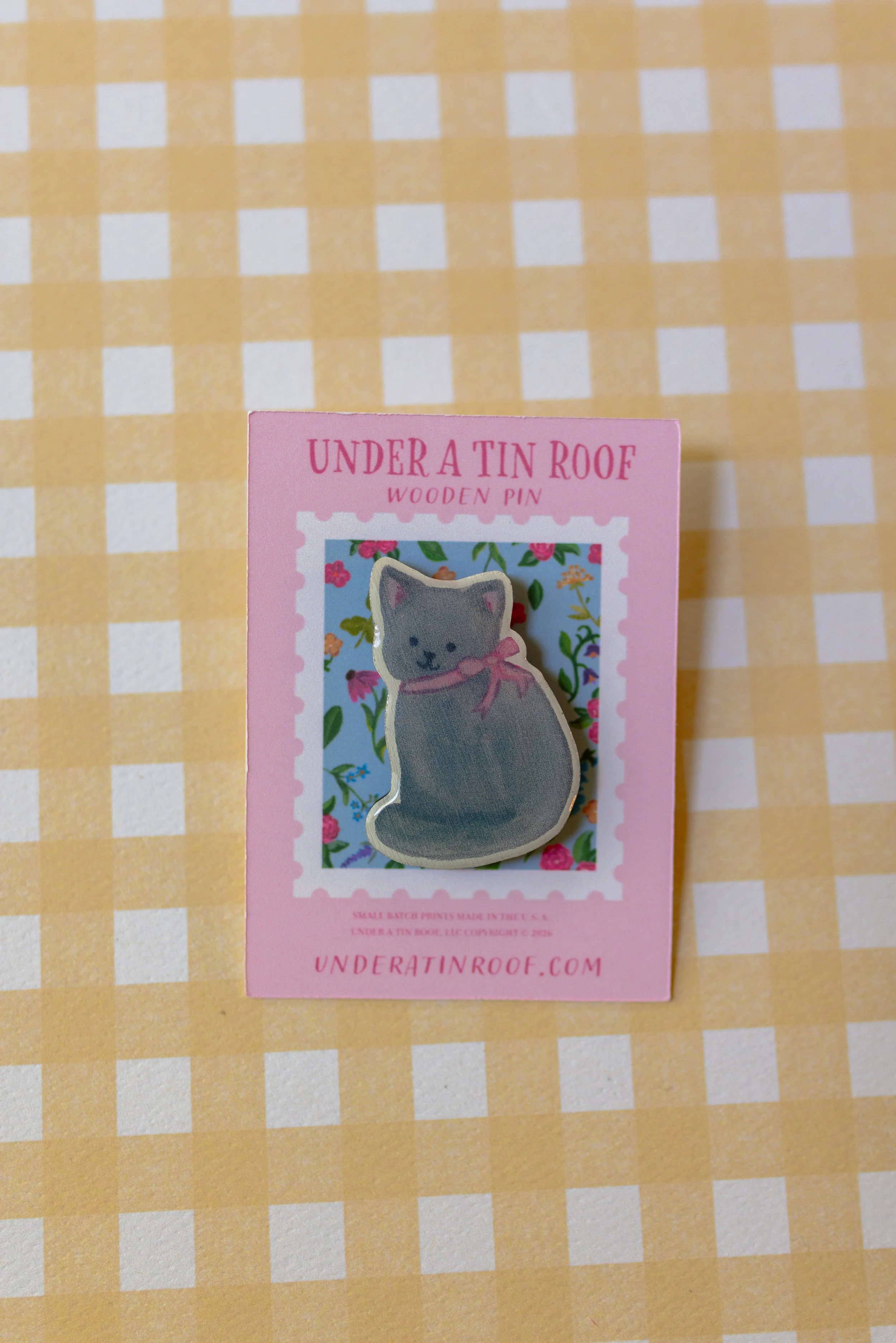 Artist-designed wooden cat pin inspired by George, the beloved garden cat, with a glossy UV resin finish.