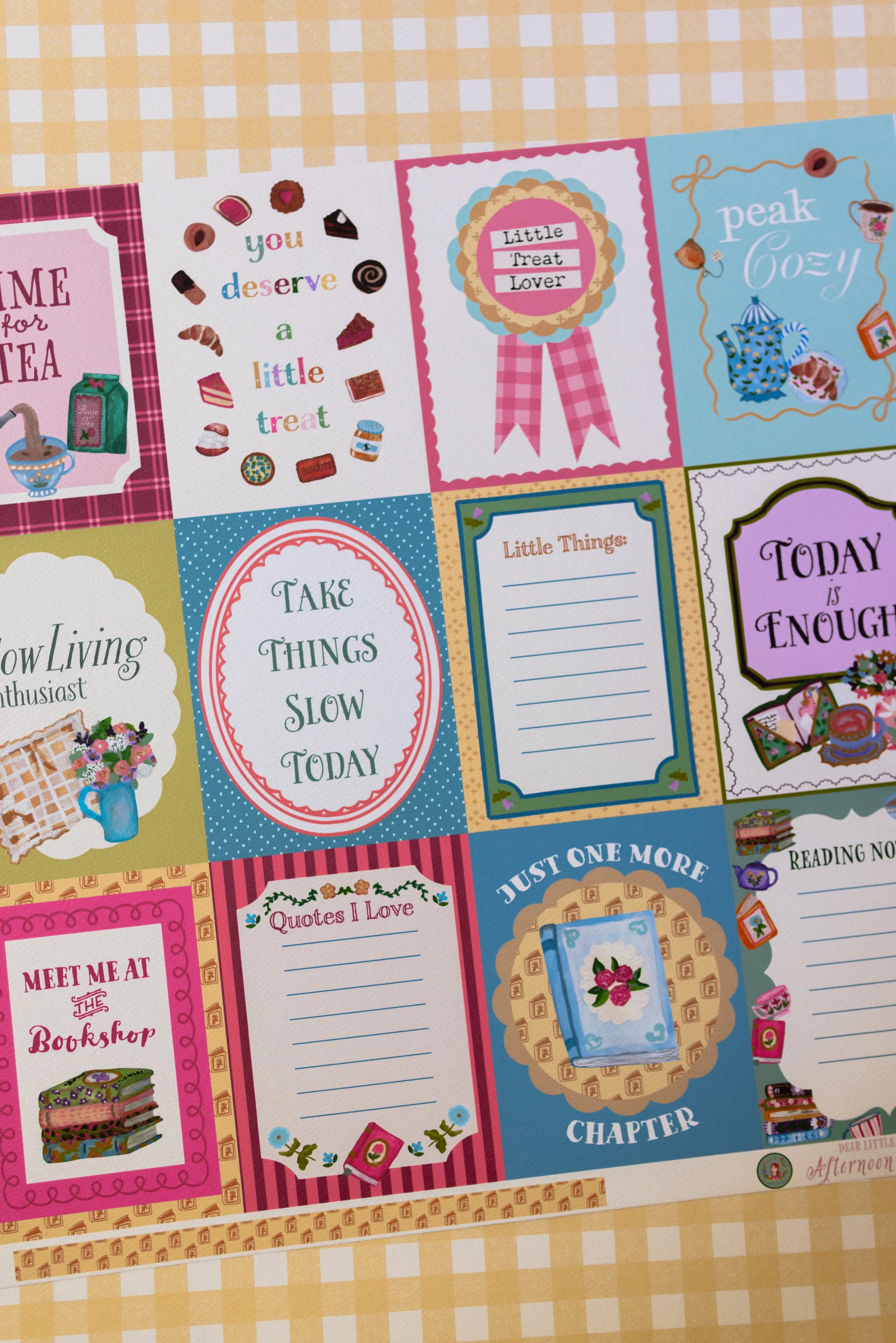 Artist-designed paper crafting collection inspired by cozy books, afternoon tea, florals, desserts, and vintage stationery.