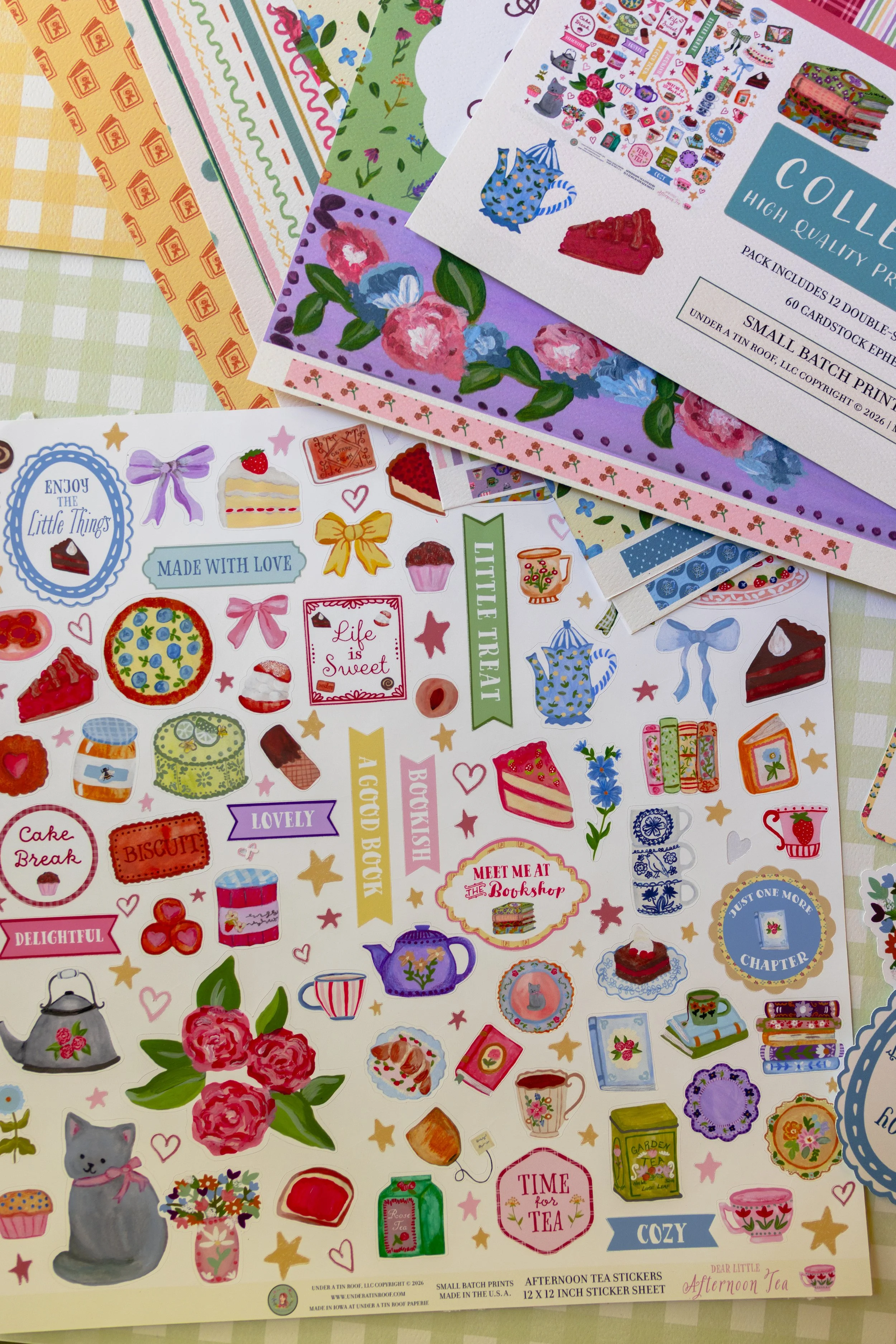 Complete scrapbook kit including 12x12 double-sided papers, ephemera pack, postage stamp stickers, and coordinating sticker sheet.