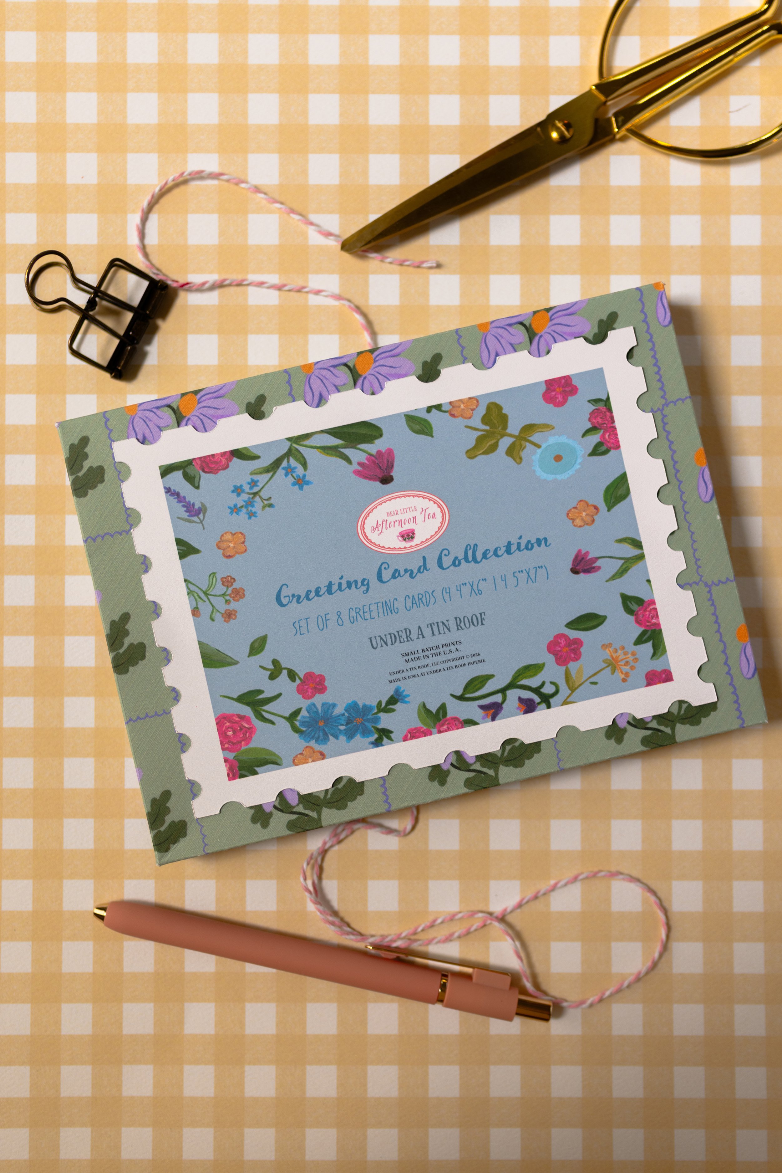 Eight whimsical greeting cards with coordinating envelopes displayed together as a complete stationery gift set.