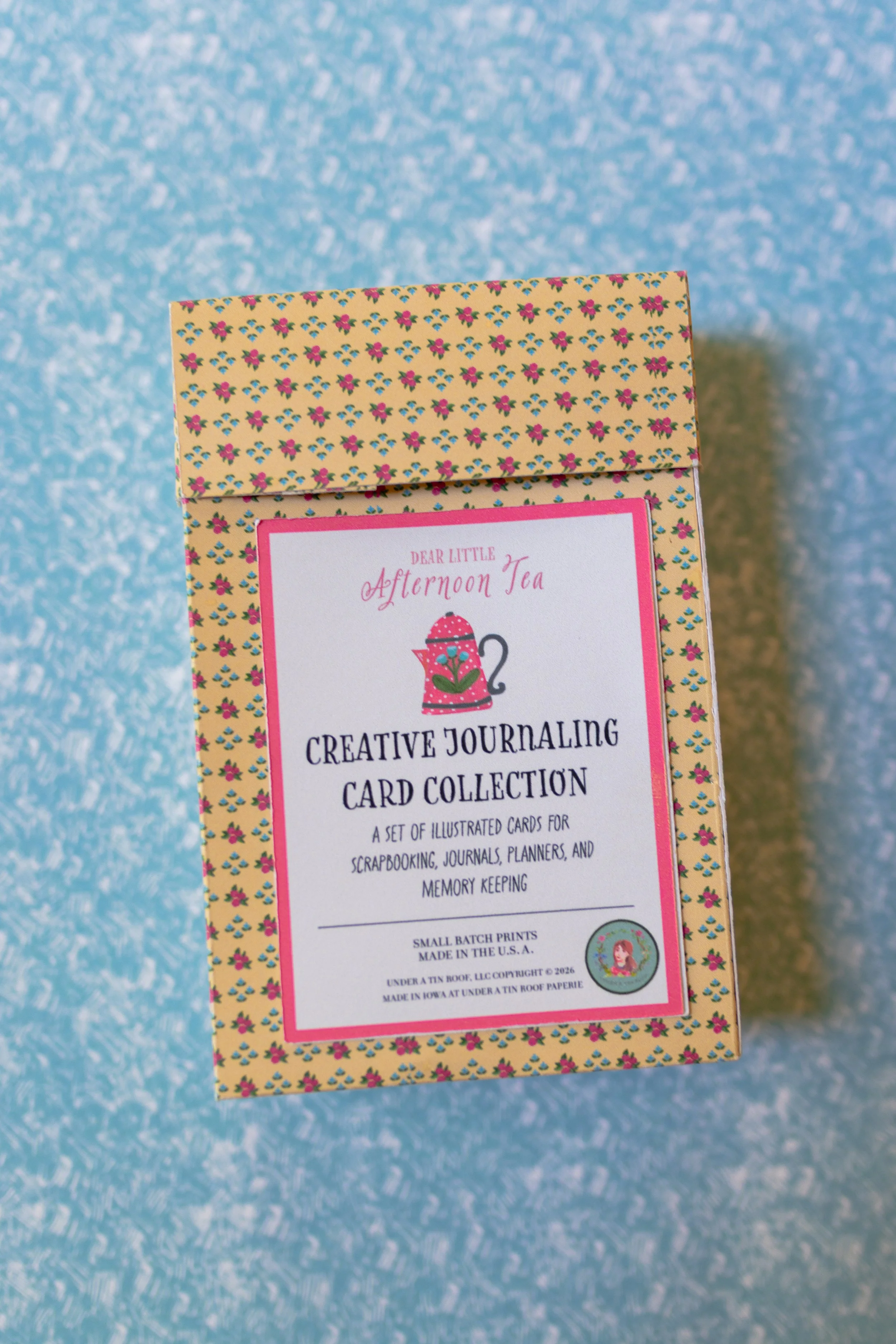 Cottagecore scrapbook cards stored inside a decorative flip-top keepsake box