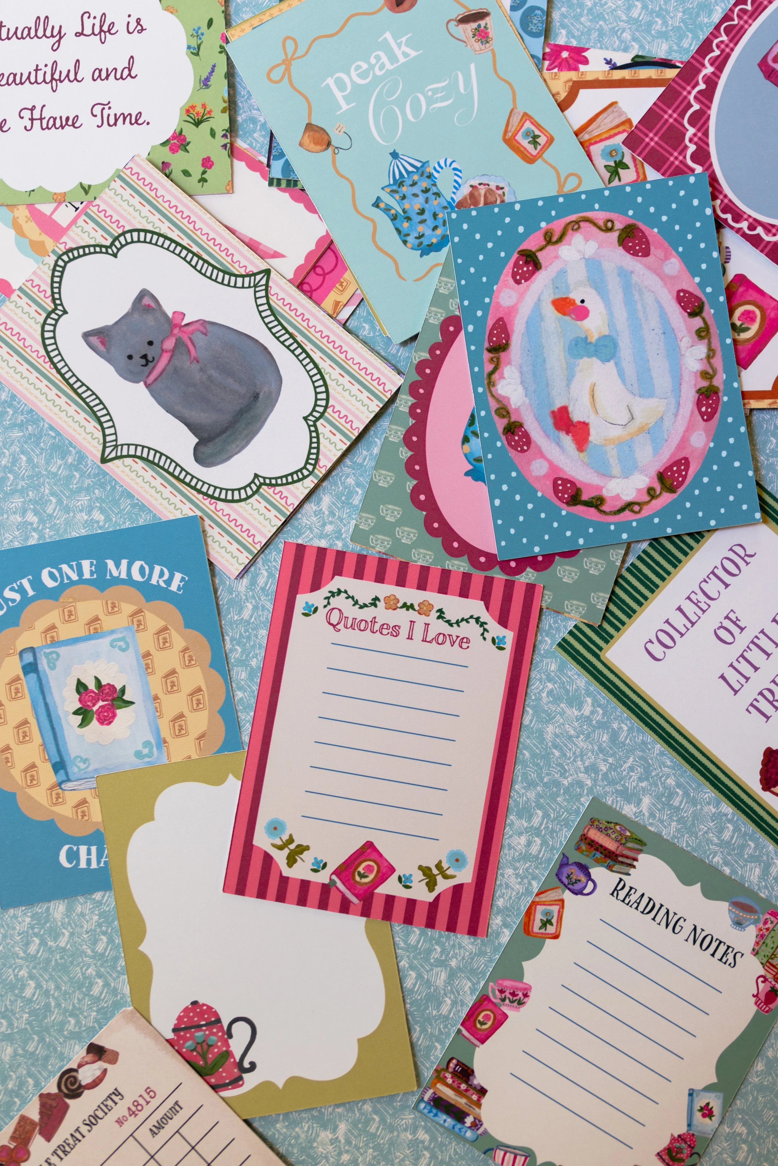 Original illustrated journaling cards with prompts, inspirational sayings, and artwork.