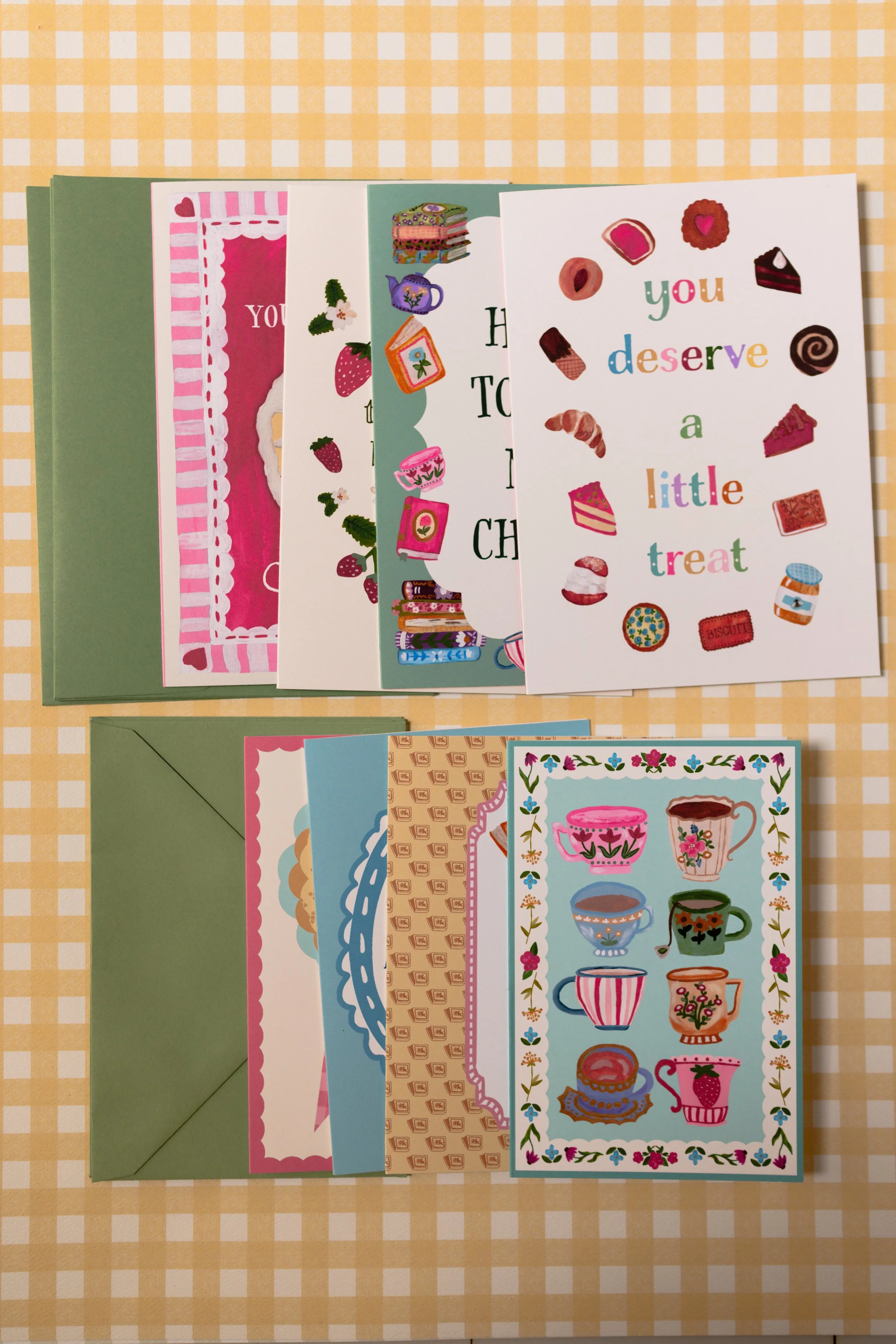 Complete greeting card collection with eight original hand-illustrated designs inspired by books, tea, cakes, and cozy afternoons.