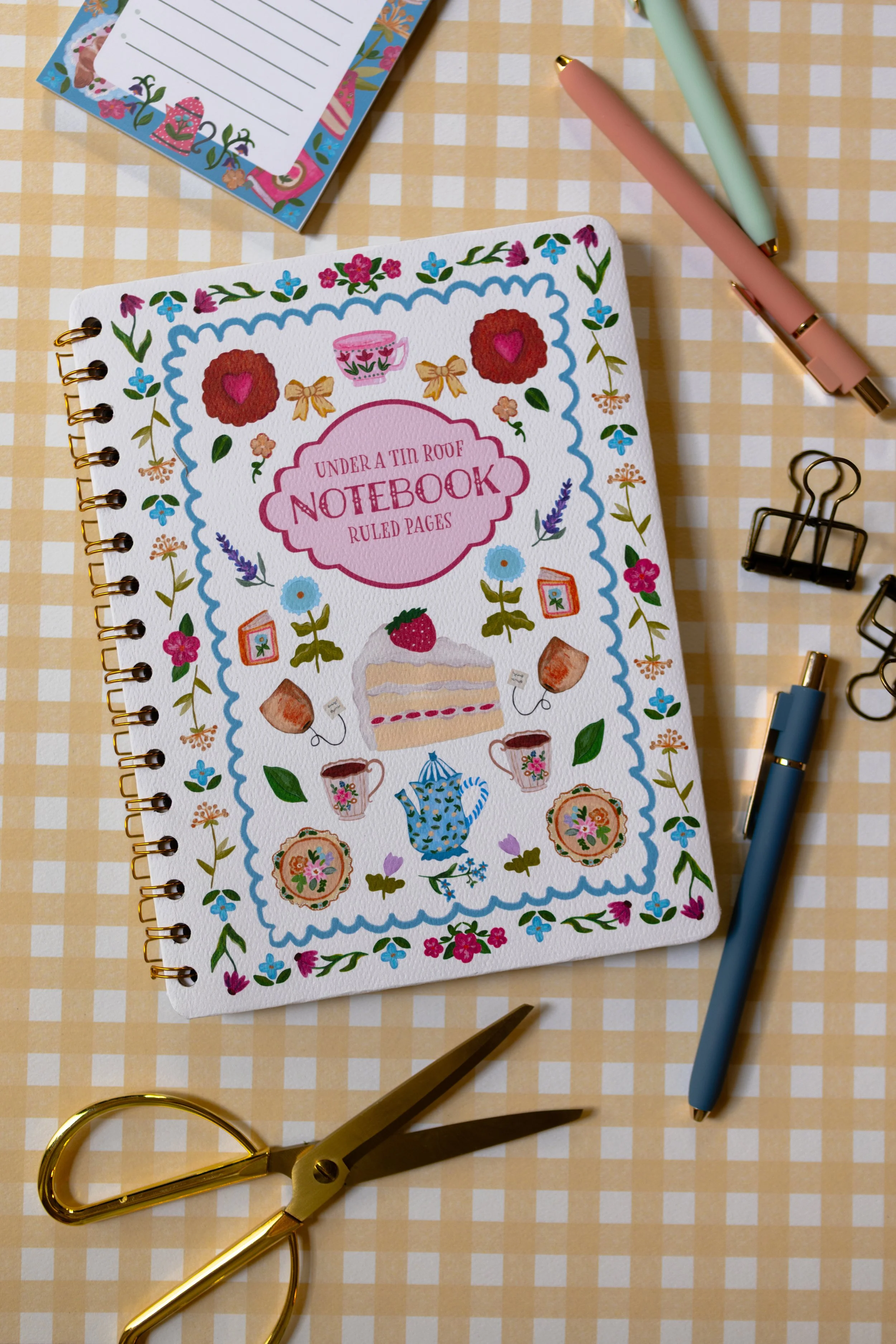 Handmade artist-designed notebook perfect for tea lovers, readers, and stationery collectors.