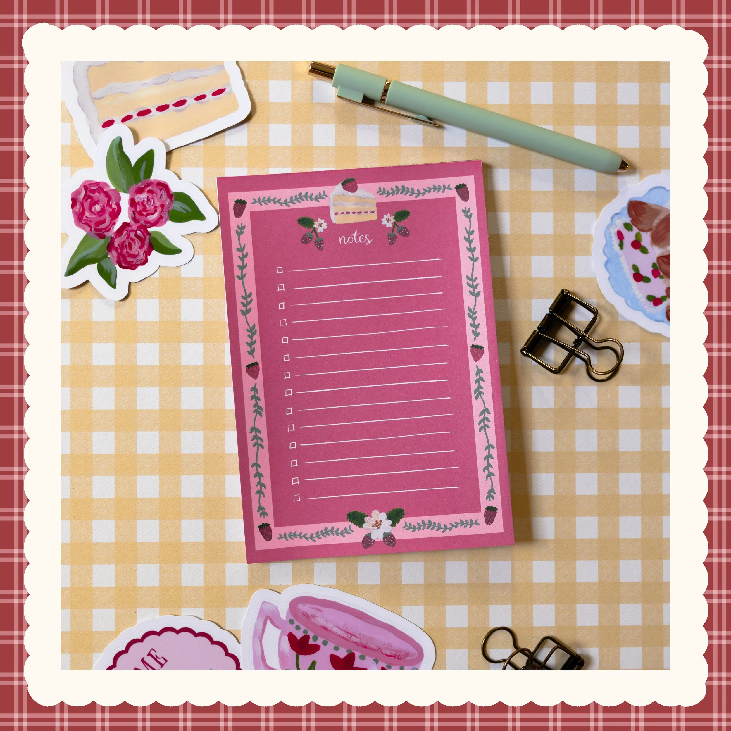 Artist-designed scrapbook supplies and stationery featuring original hand-illustrated papers, stickers, ephemera, journals, greeting cards, and bookmarks inspired by cozy books, afternoon tea, florals, desserts, and cottagecore charm.