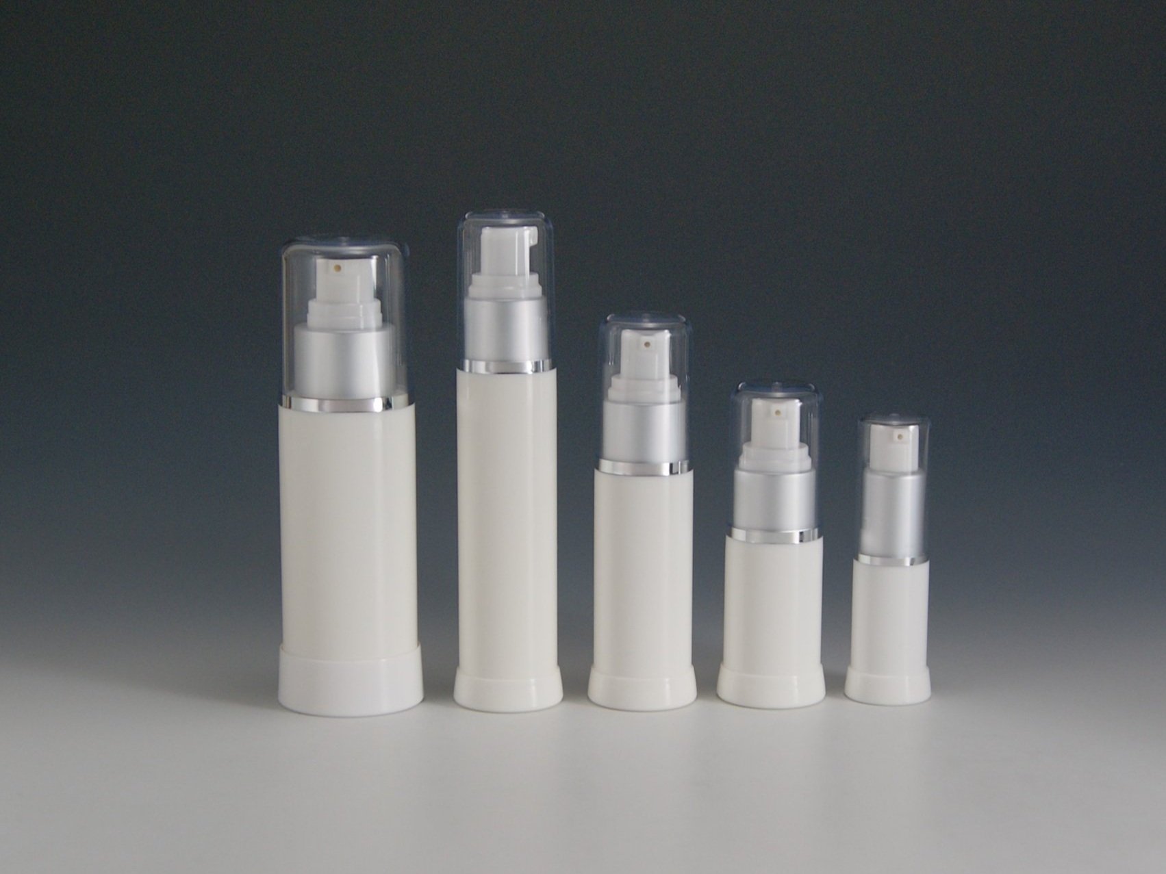 Airless+201+White+Bottle+with+Matte+Silver+Pump+and+Clear+Cap.jpg