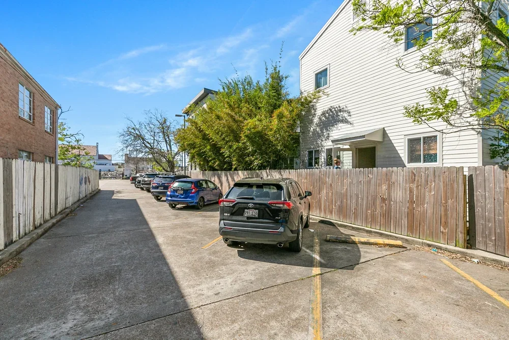 New orleans private commercial boutique office space parking lot free parking accessible parking parking new orelans fence and parking lot