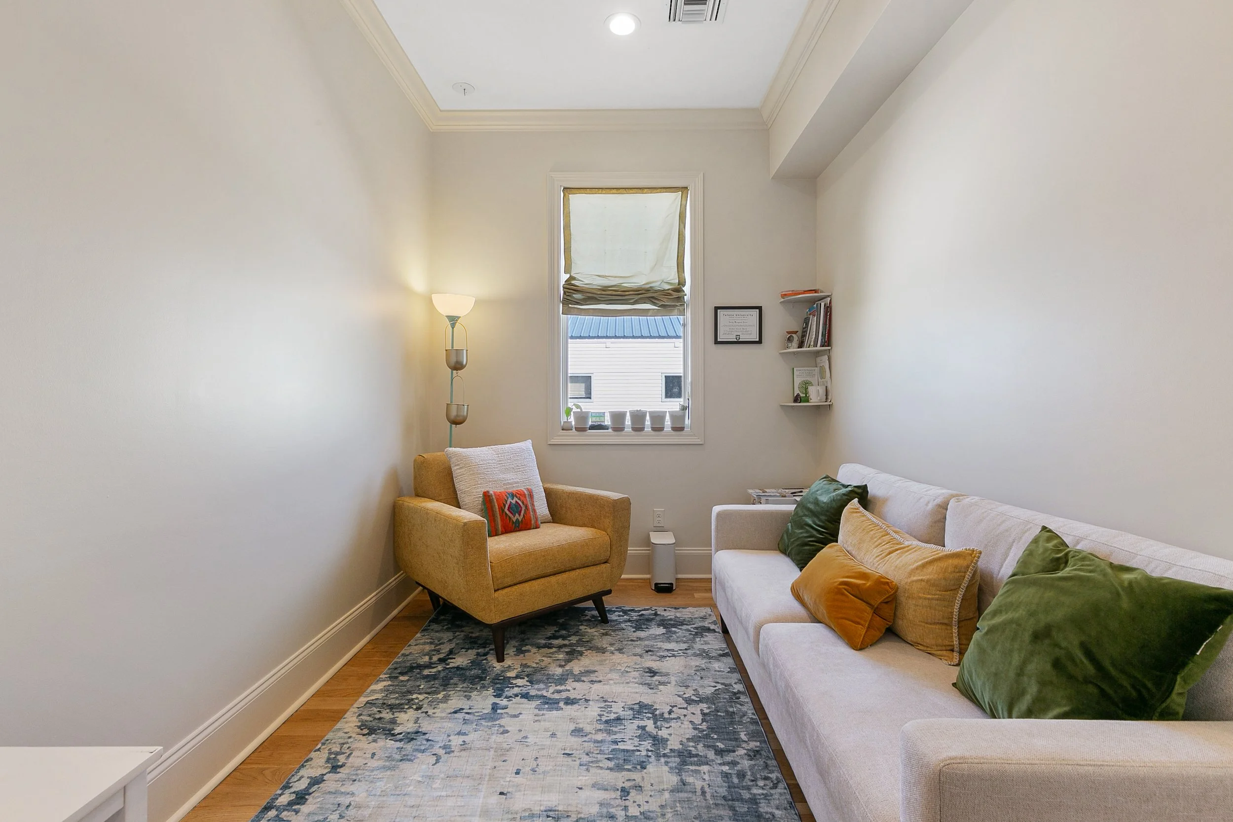 office space studio space office rental new orleans yellow chair couch window interior design